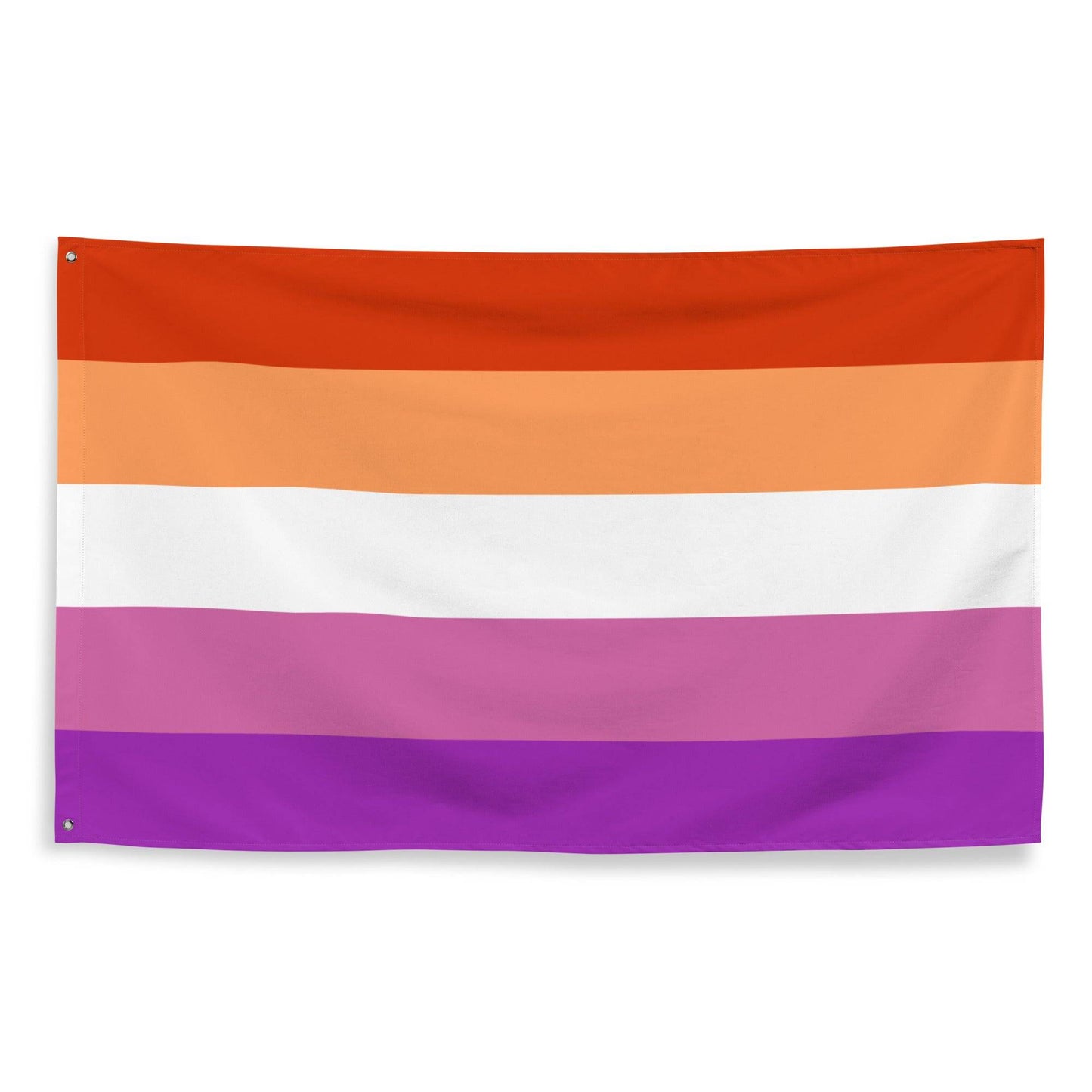 A Pridelity Lesbian Pride Flag with horizontal stripes in dark orange, orange, light orange, white, pink, and purple hung on a white brick wall outside the Rainbow Shop.
