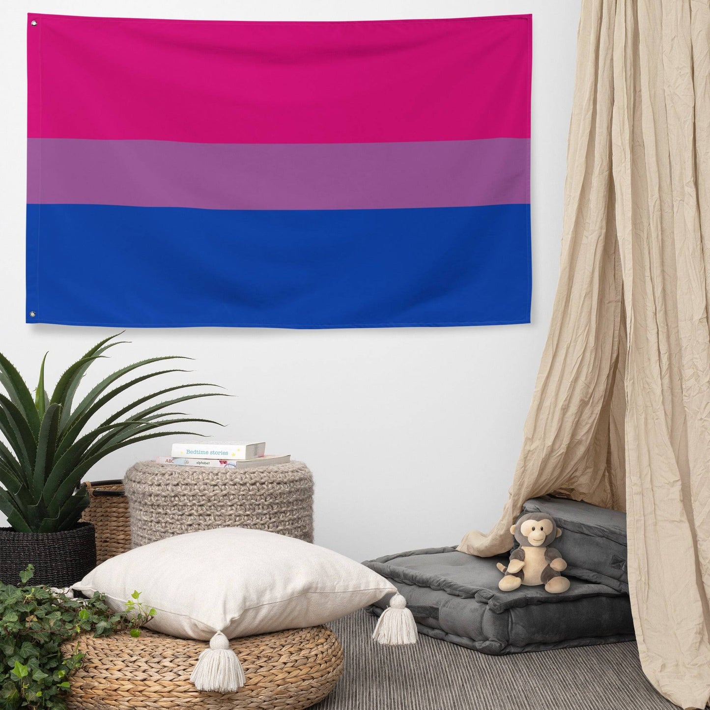 The Bisexual Pride Flag from Pridelity boasts horizontal stripes with a vibrant design: a bright pink on top, a thin purple in the middle, and a deep blue at the bottom. Displayed elegantly against a white brick wall, it embodies the spirit of Pride.