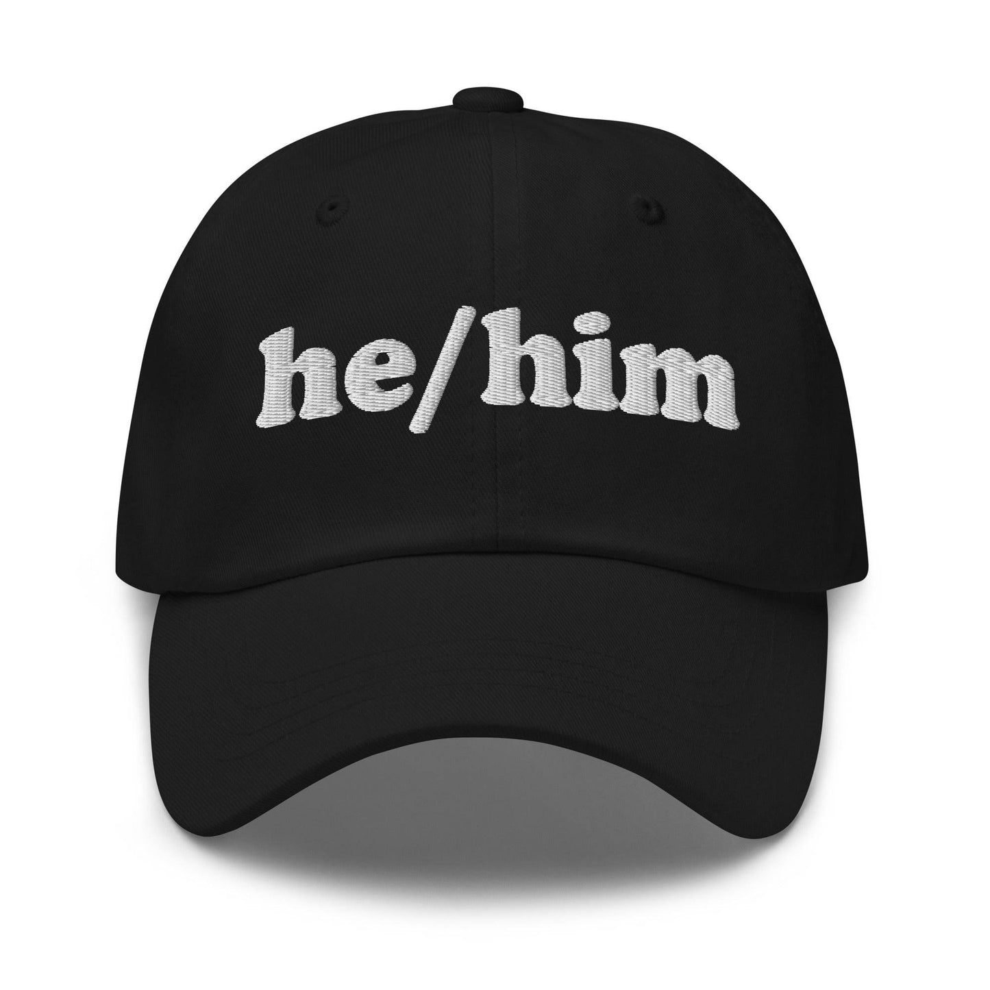 Introducing the He/Him Cap by Pridelity: A stylish black cap featuring "he/him" embroidered in white on the front. It adds a subtle yet meaningful touch to pride outfits while celebrating identity with simplicity and elegance.