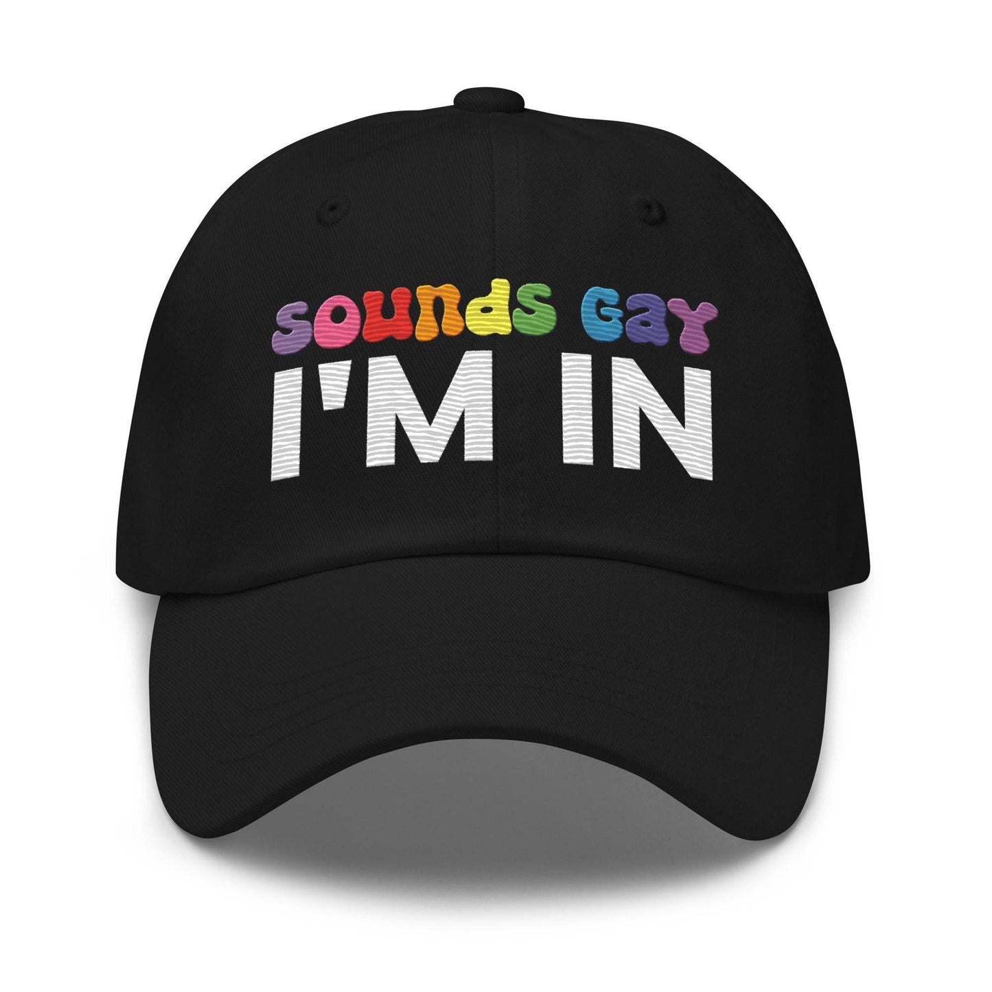 Introducing the "Sounds Gay I'm In Cap" by Pridelity, a black baseball cap ideal for pride outfits. It showcases the vibrant phrase "Sounds Gay" in contrast to the striking white "I'm In," making it a standout accessory for any celebration.