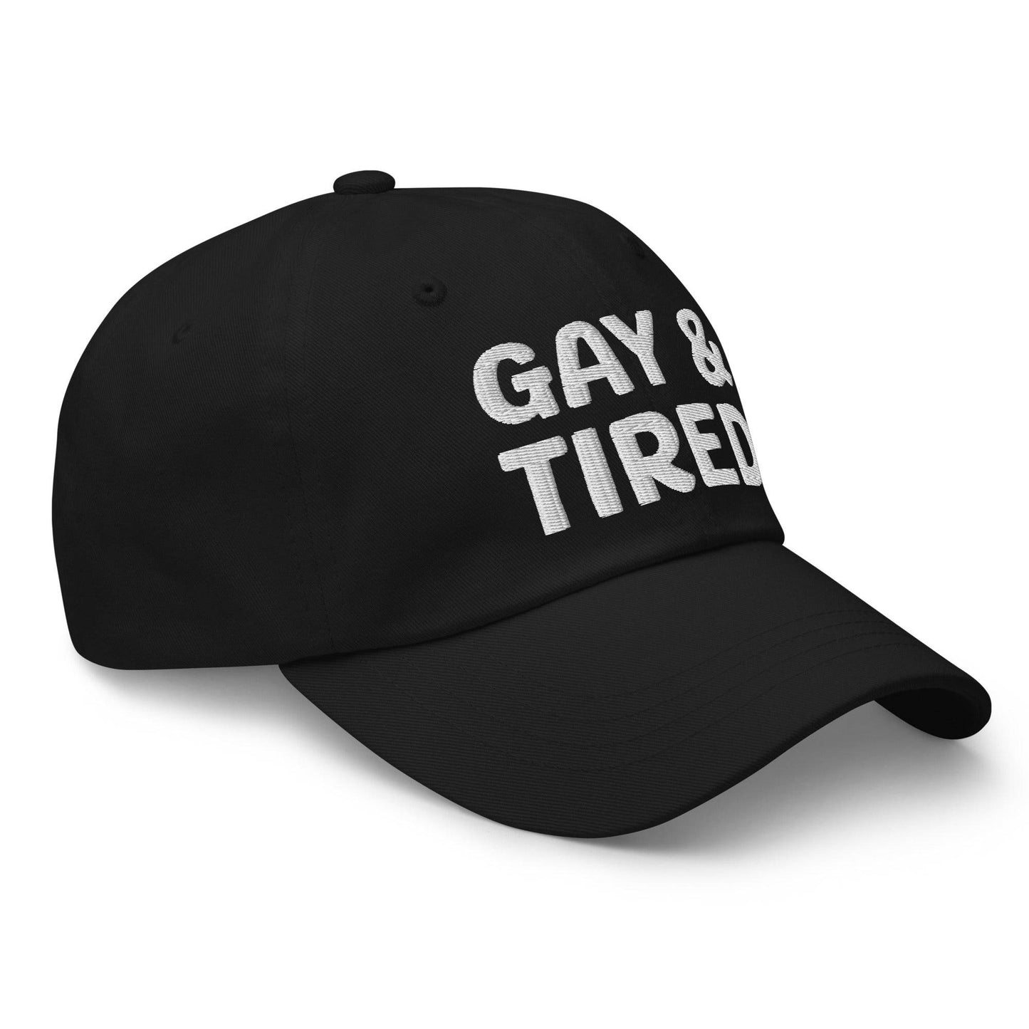 Introducing the Gay & Tired Cap by Pridelity, featuring bold white "GAY & TIRED" embroidery on its sleek black design—an ideal addition to bring both honesty and style to your pride outfits.
