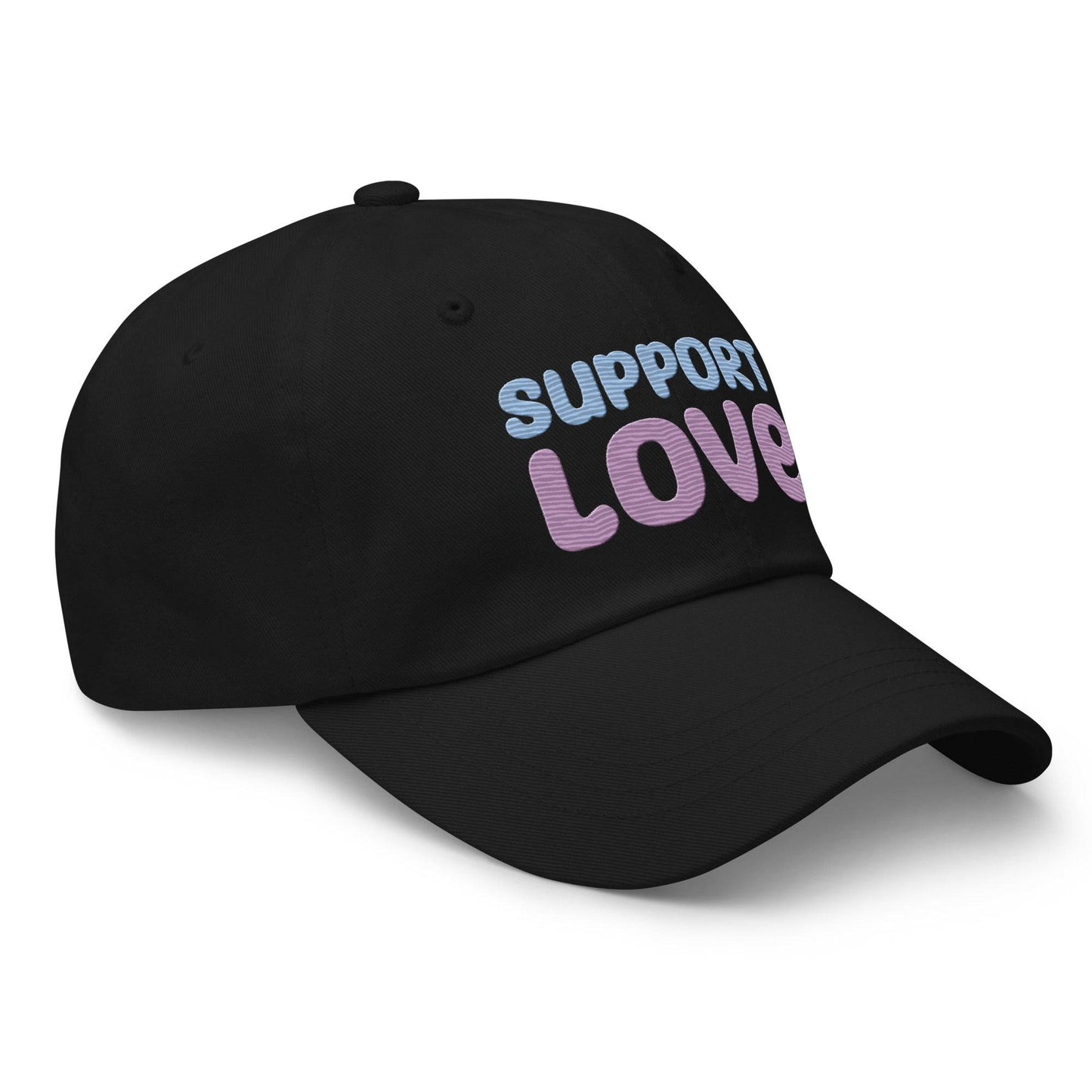 Discover the "Support Love Cap" by Pridelity, a black cap ideal for pride outfits, featuring the phrase "Support Love" embroidered on the front in light blue and pink letters.