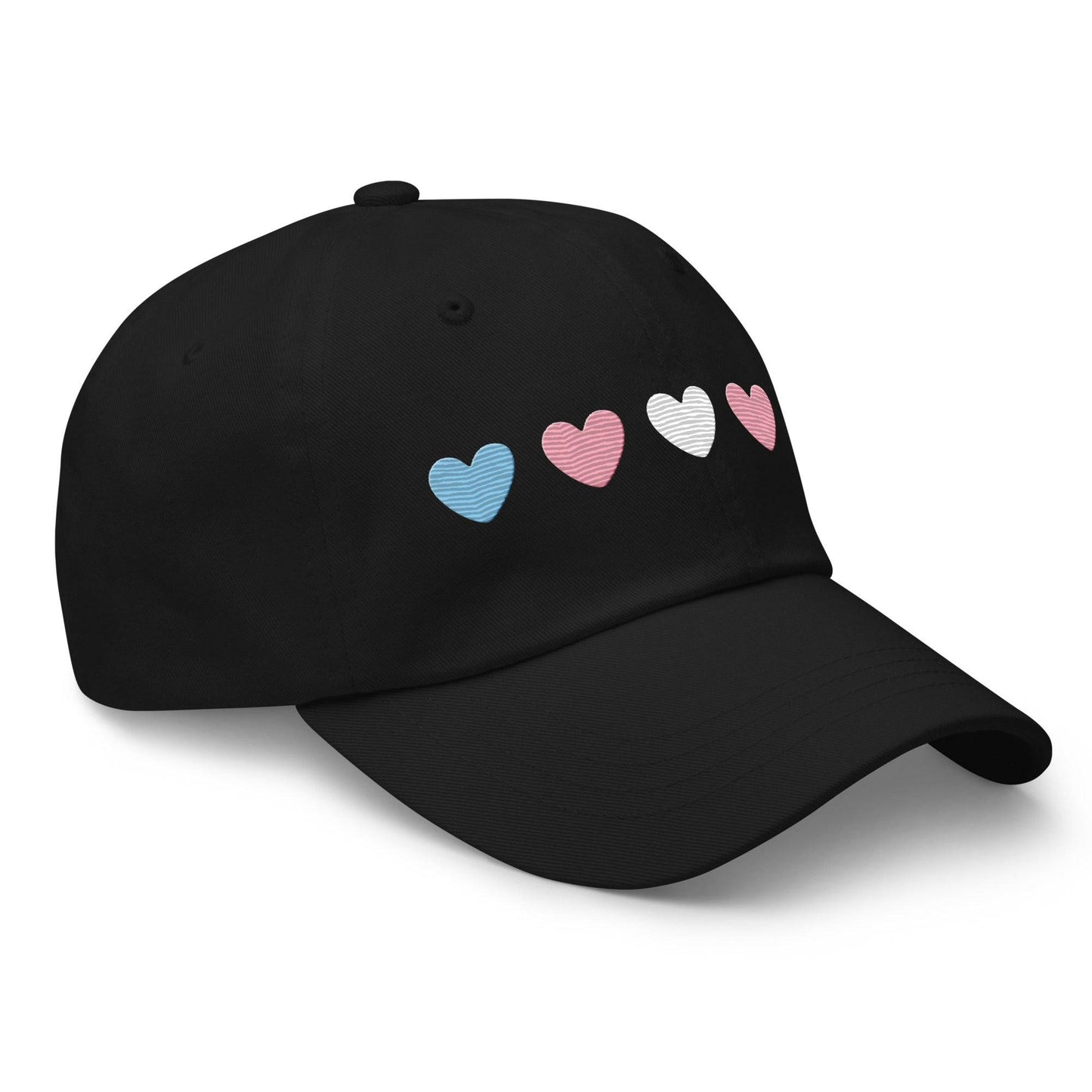 Introducing the "Trans Hearts Cap" from Pridelity, a black baseball cap adorned with embroidered pastel heart designs in pink, white, and blue on the front, making it an ideal accessory to enhance your pride outfits.
