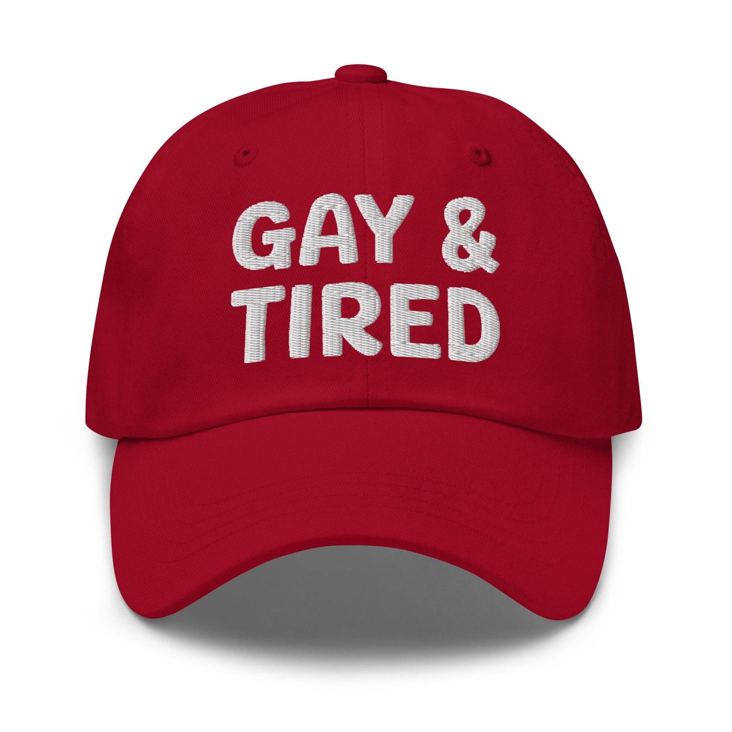 Introducing the Gay & Tired Cap by Pridelity, featuring bold white "GAY & TIRED" embroidery on its sleek black design—an ideal addition to bring both honesty and style to your pride outfits.