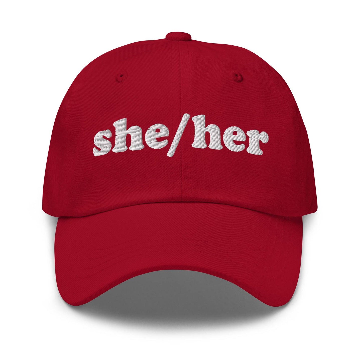 Add the Pridelity "She/Her Cap" to your pride wardrobe. This black baseball cap features "she/her" embroidered in white on the front center, making it a perfect addition to your pride outfits.