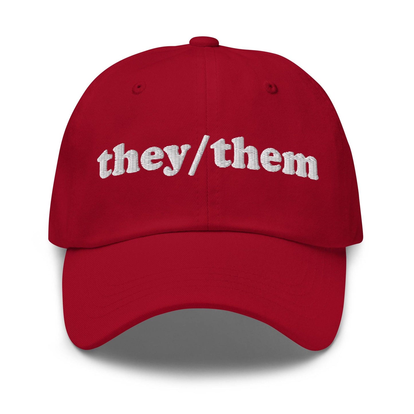 Introducing the They/Them Cap by Pridelity, a stylish black cap with "they/them" embroidered in white on the front, making it an ideal accessory for pairing with pride outfits.