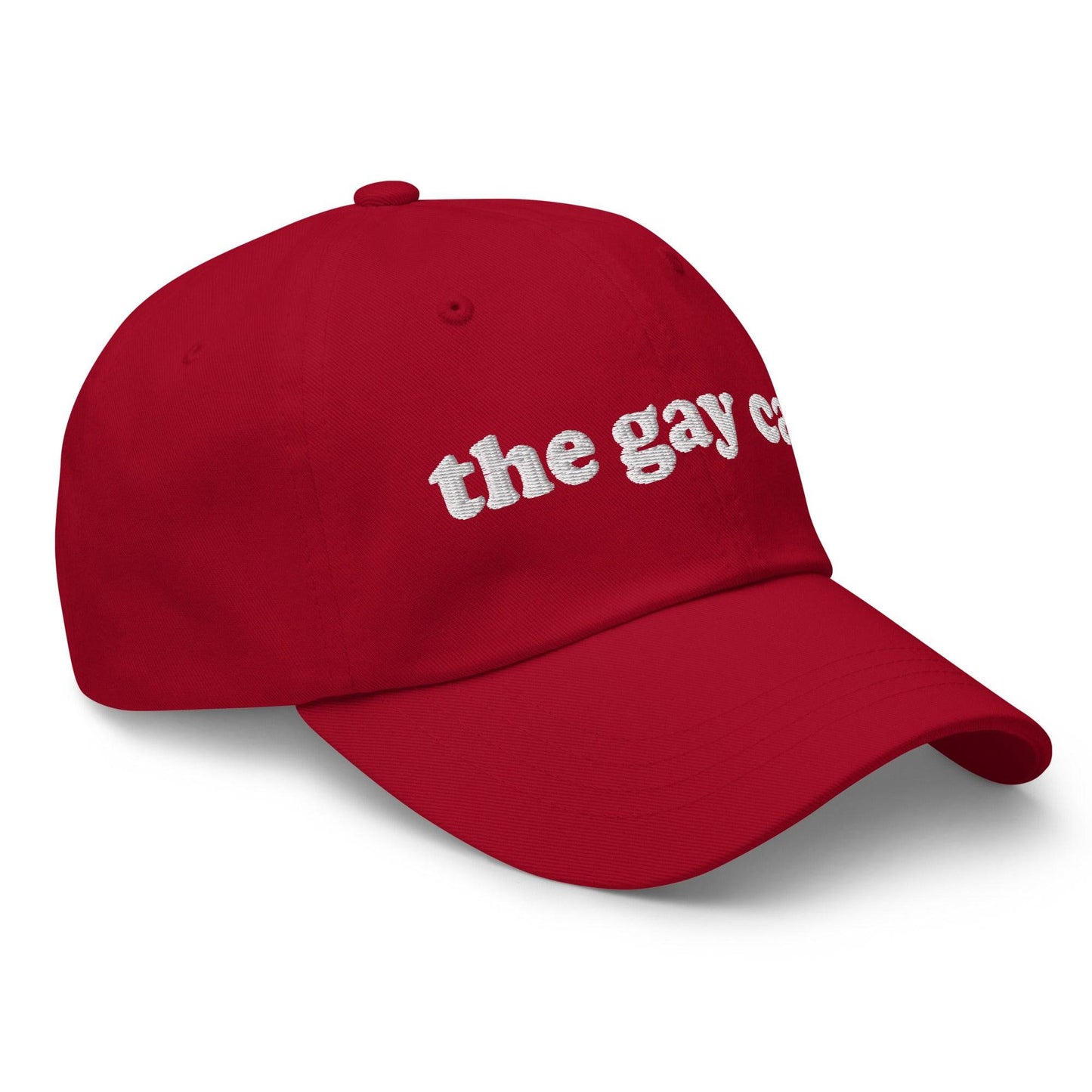 This stylish black cap from Pridelity features white embroidered text reading "The Gay Cap" on the front, making it an ideal accessory for pride outfits.