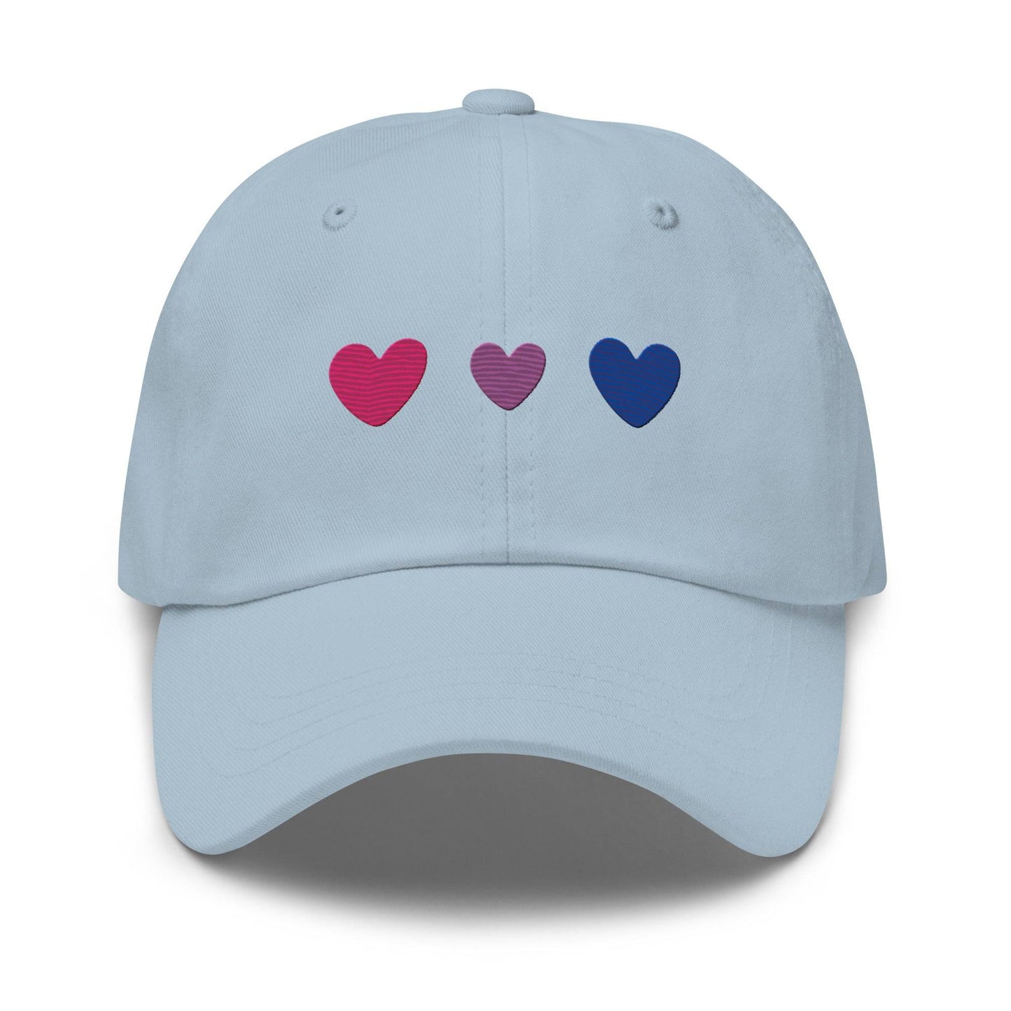 Introducing the Bisexual Hearts Cap by Pridelity, a black baseball cap from our Pride Collections featuring three embroidered hearts in a row on the front, colored pink, purple, and blue from left to right.