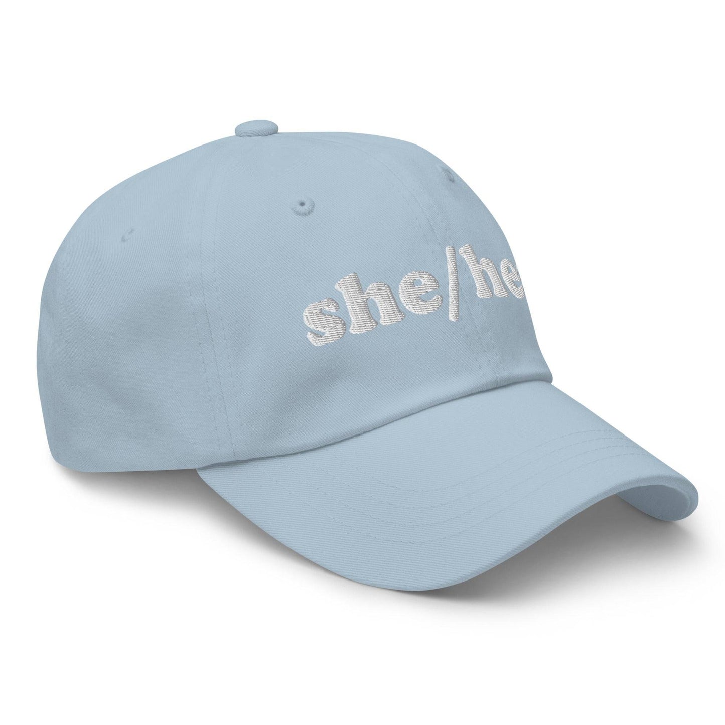 Add the Pridelity "She/Her Cap" to your pride wardrobe. This black baseball cap features "she/her" embroidered in white on the front center, making it a perfect addition to your pride outfits.