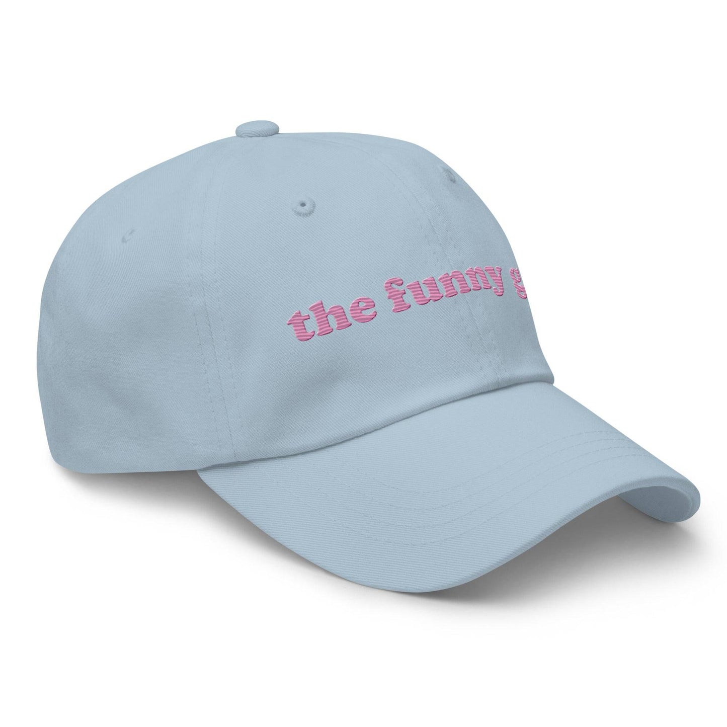 Introducing "The Funny Gay Cap" by Pridelity, a white cap featuring pink embroidered text that reads "the funny gay," ideal for adding a playful flair to your pride ensembles.
