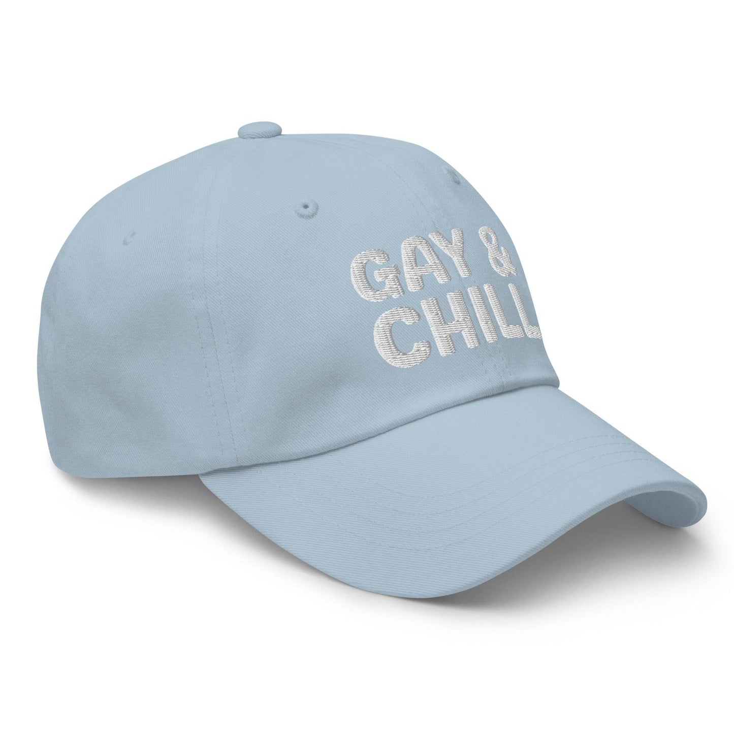 Introducing the Gay & Chill Cap by Pridelity, a black baseball cap ideal for pride outfits, featuring "GAY & CHILL" embroidered in white across the front.