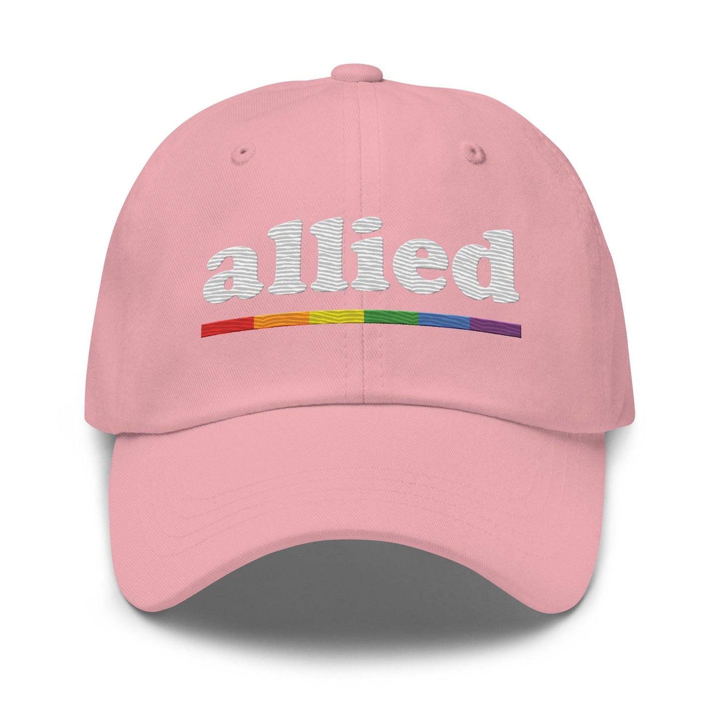 A Pridelity Allied Cap featuring "allied" embroidered in white above a vibrant, Pride-inspired rainbow line.