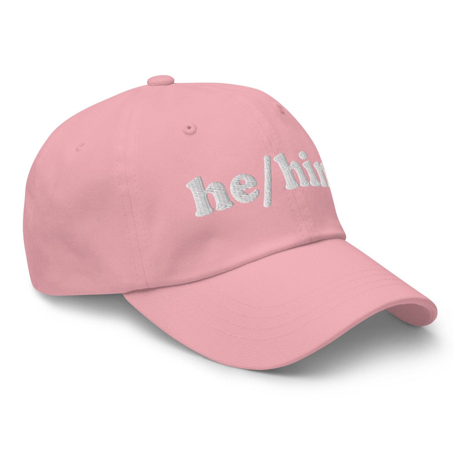 Introducing the He/Him Cap by Pridelity: A stylish black cap featuring "he/him" embroidered in white on the front. It adds a subtle yet meaningful touch to pride outfits while celebrating identity with simplicity and elegance.