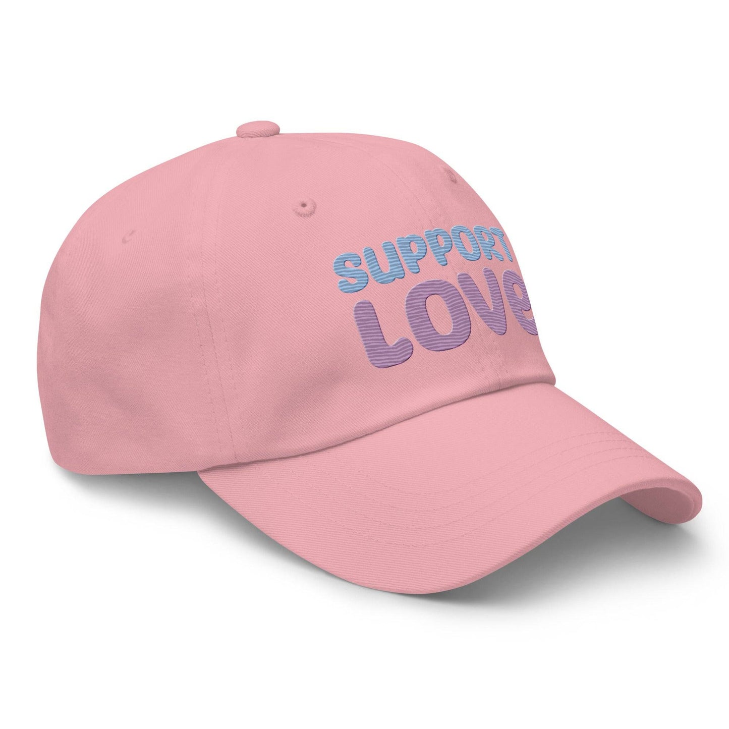 Discover the "Support Love Cap" by Pridelity, a black cap ideal for pride outfits, featuring the phrase "Support Love" embroidered on the front in light blue and pink letters.