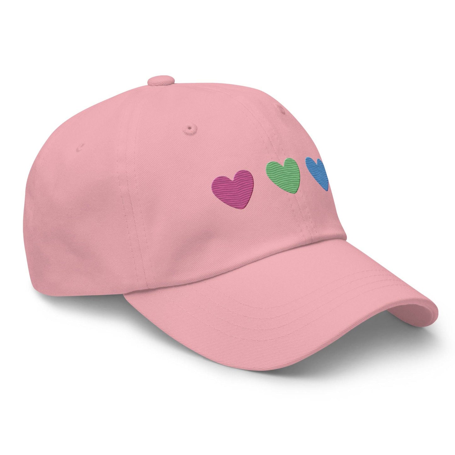 The Polysexual Hearts Cap by Pridelity is a black baseball cap ideal for pride outfits, featuring three embroidered hearts in pink, green, and blue arranged in a row on the front.