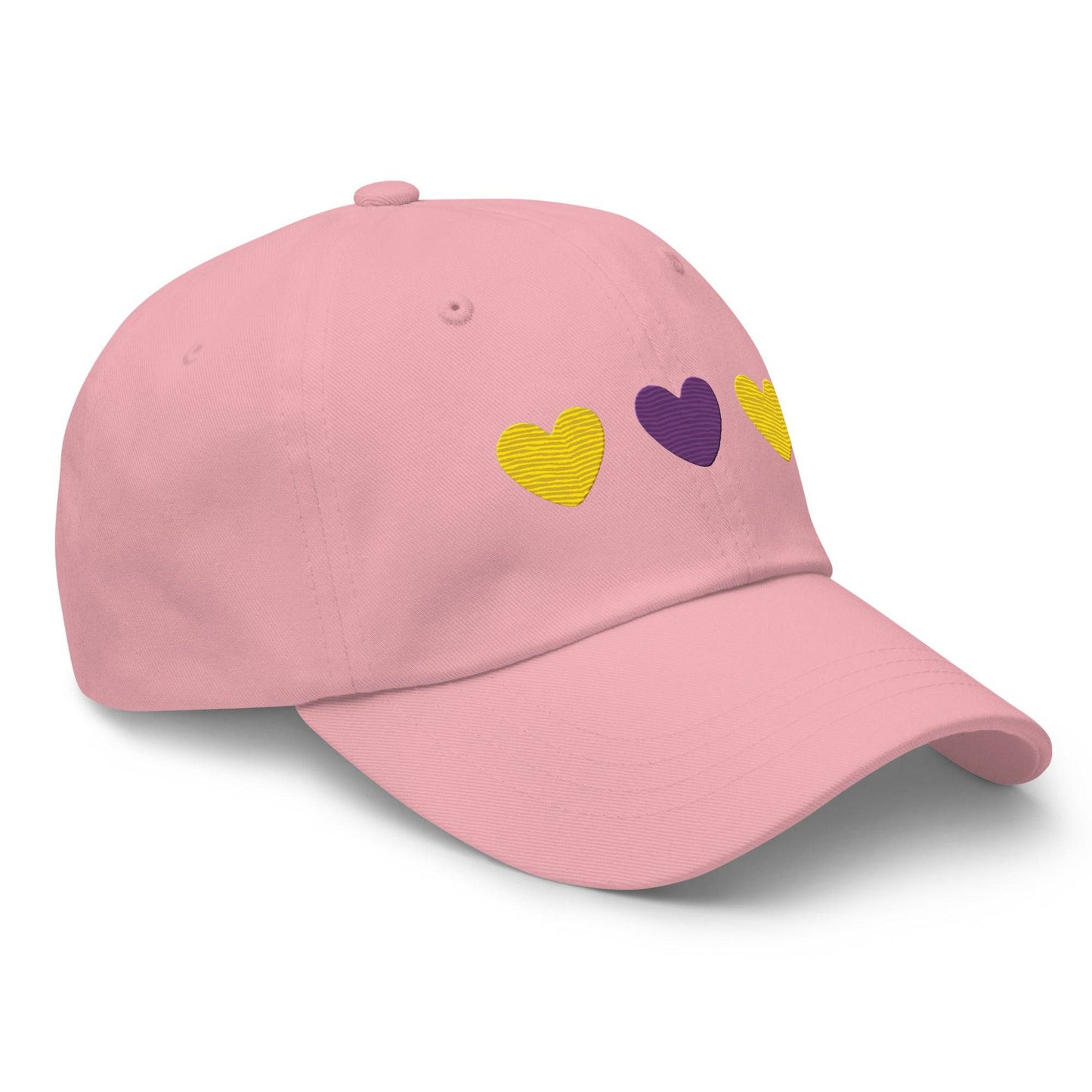 Introducing the Intersex Hearts Cap by Pridelity, a stylish black baseball cap ideal for pride outfits. It features three embroidered hearts, with two yellow ones on the sides and a purple heart prominently in the center.