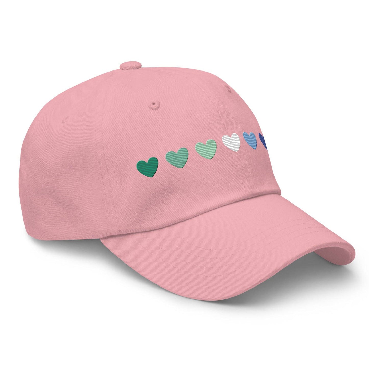 The Gay Men Hearts Cap by Pridelity is a black cap adorned with a row of seven hearts in gradient colors from green to blue, making it an ideal accessory for adding a subtle yet vibrant touch to pride outfits.