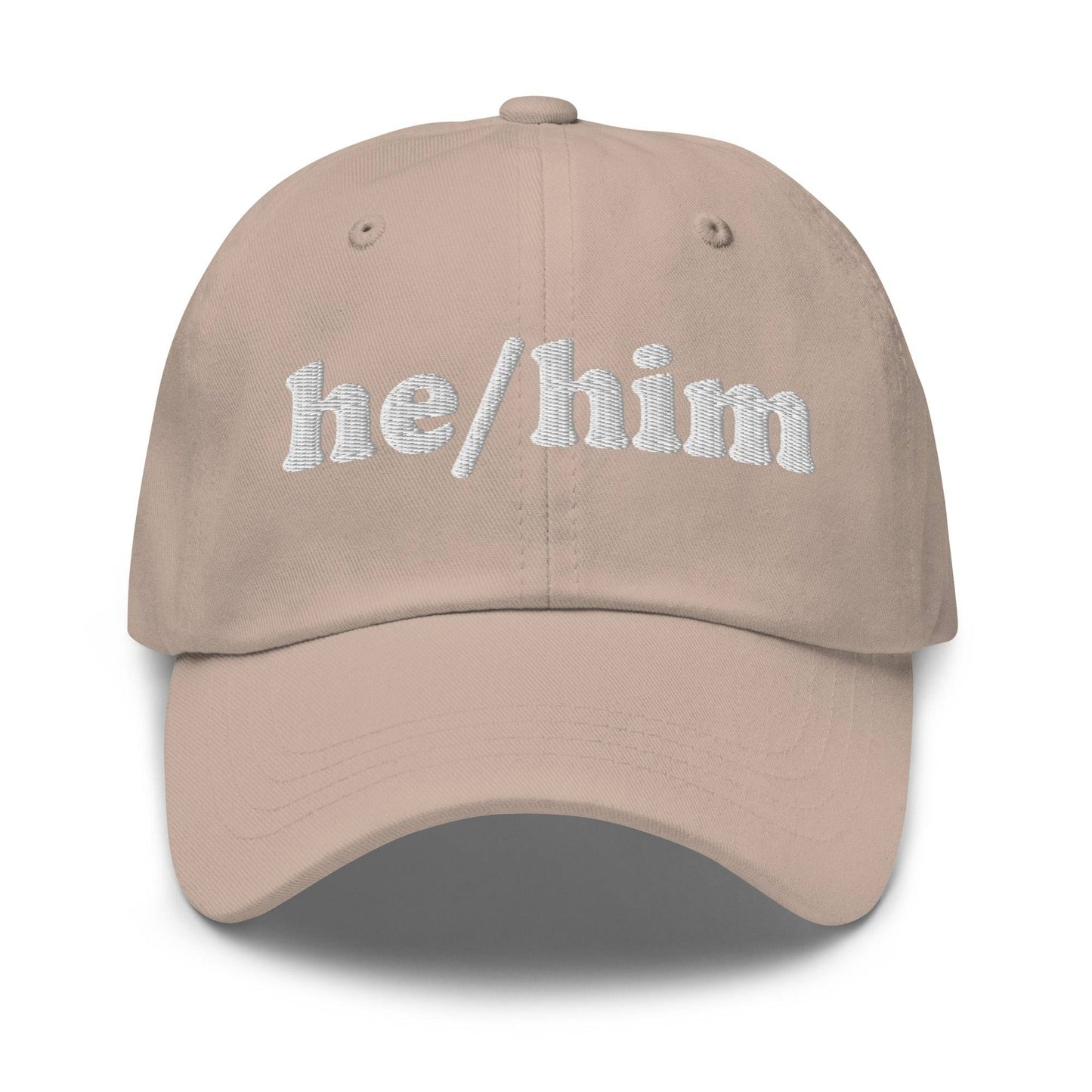 Introducing the He/Him Cap by Pridelity: A stylish black cap featuring "he/him" embroidered in white on the front. It adds a subtle yet meaningful touch to pride outfits while celebrating identity with simplicity and elegance.