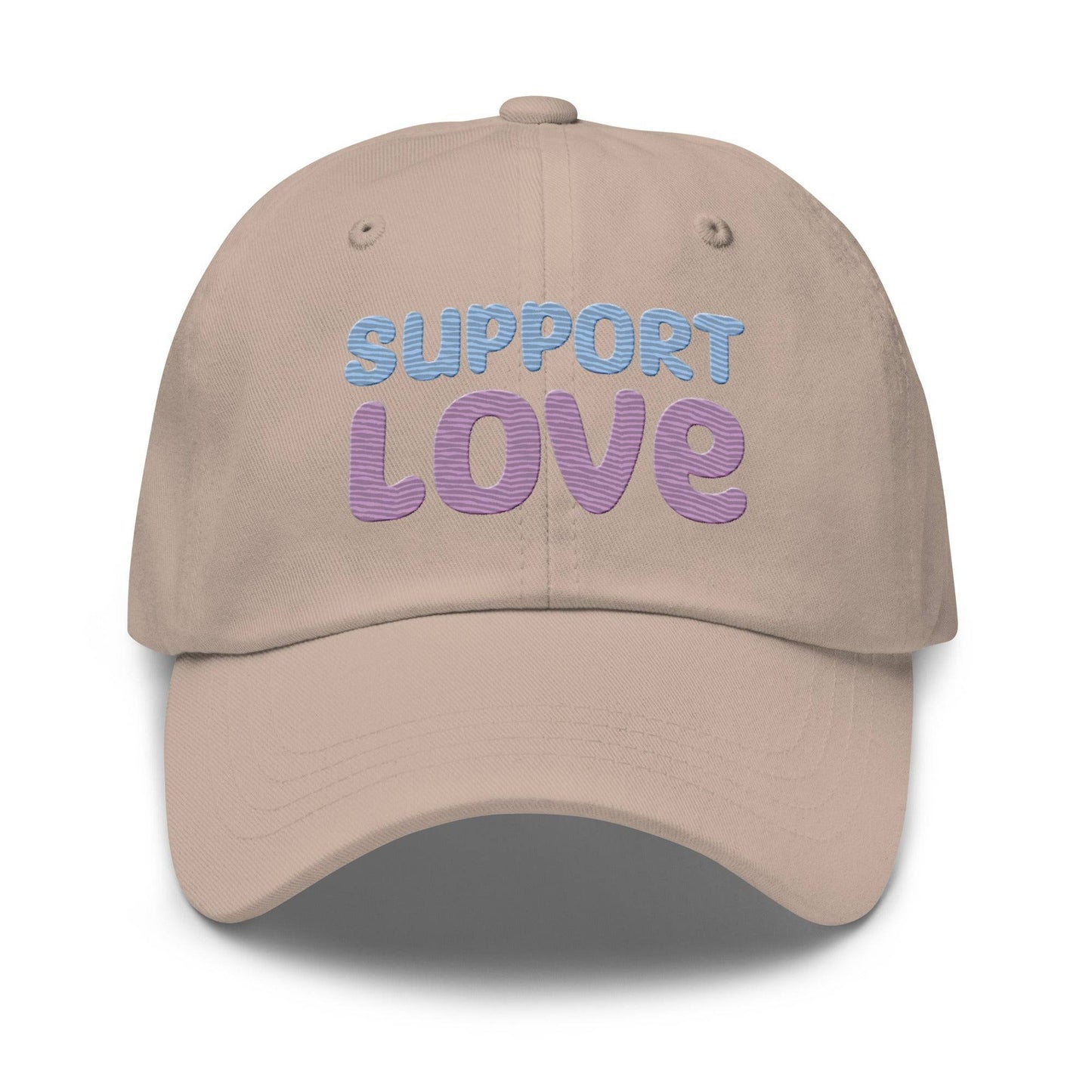 Discover the "Support Love Cap" by Pridelity, a black cap ideal for pride outfits, featuring the phrase "Support Love" embroidered on the front in light blue and pink letters.