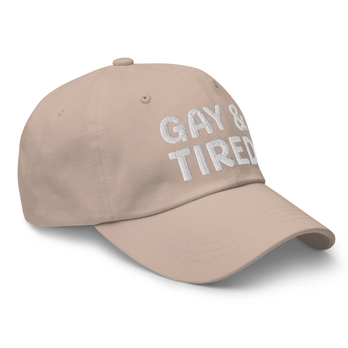 Introducing the Gay & Tired Cap by Pridelity, featuring bold white "GAY & TIRED" embroidery on its sleek black design—an ideal addition to bring both honesty and style to your pride outfits.