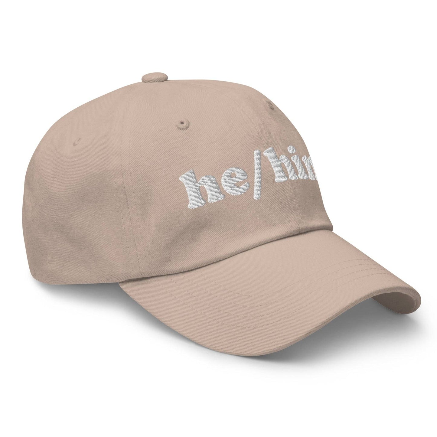 Introducing the He/Him Cap by Pridelity: A stylish black cap featuring "he/him" embroidered in white on the front. It adds a subtle yet meaningful touch to pride outfits while celebrating identity with simplicity and elegance.