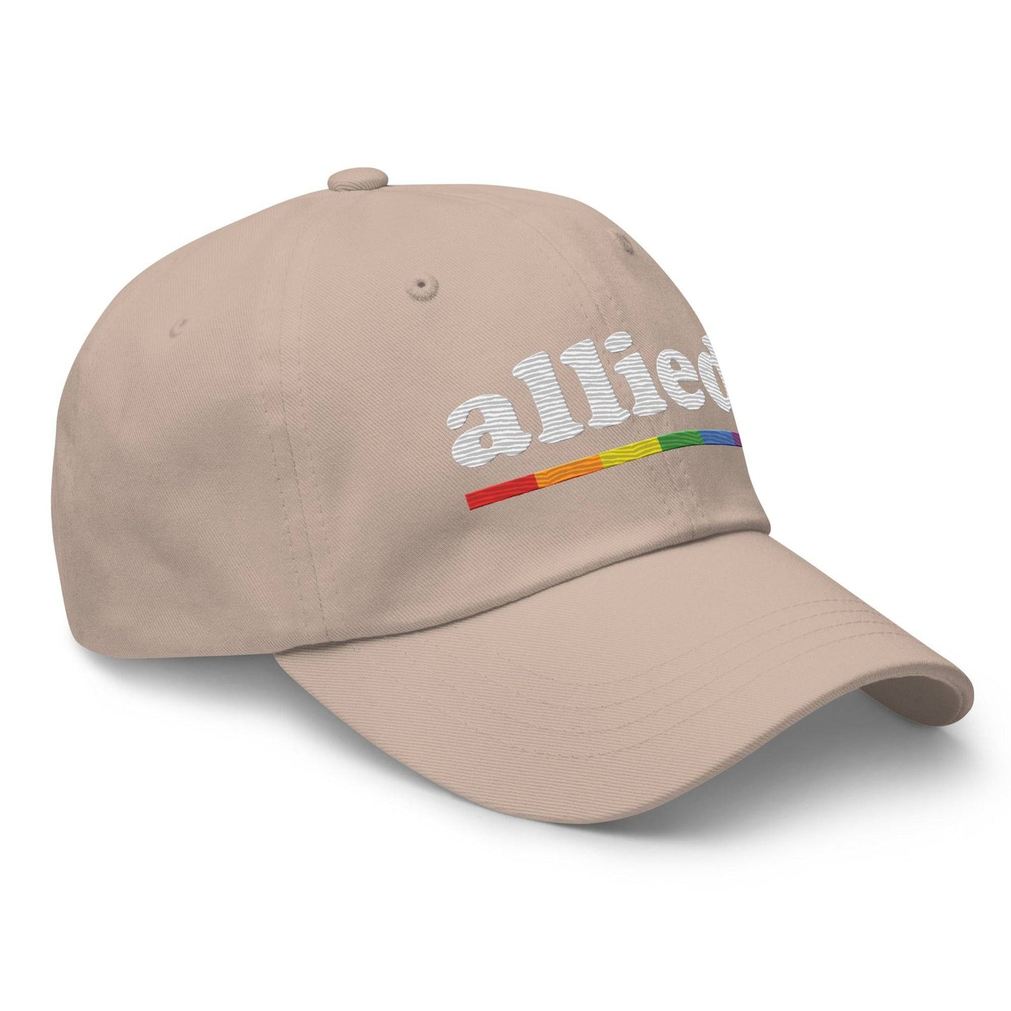 A Pridelity Allied Cap featuring "allied" embroidered in white above a vibrant, Pride-inspired rainbow line.
