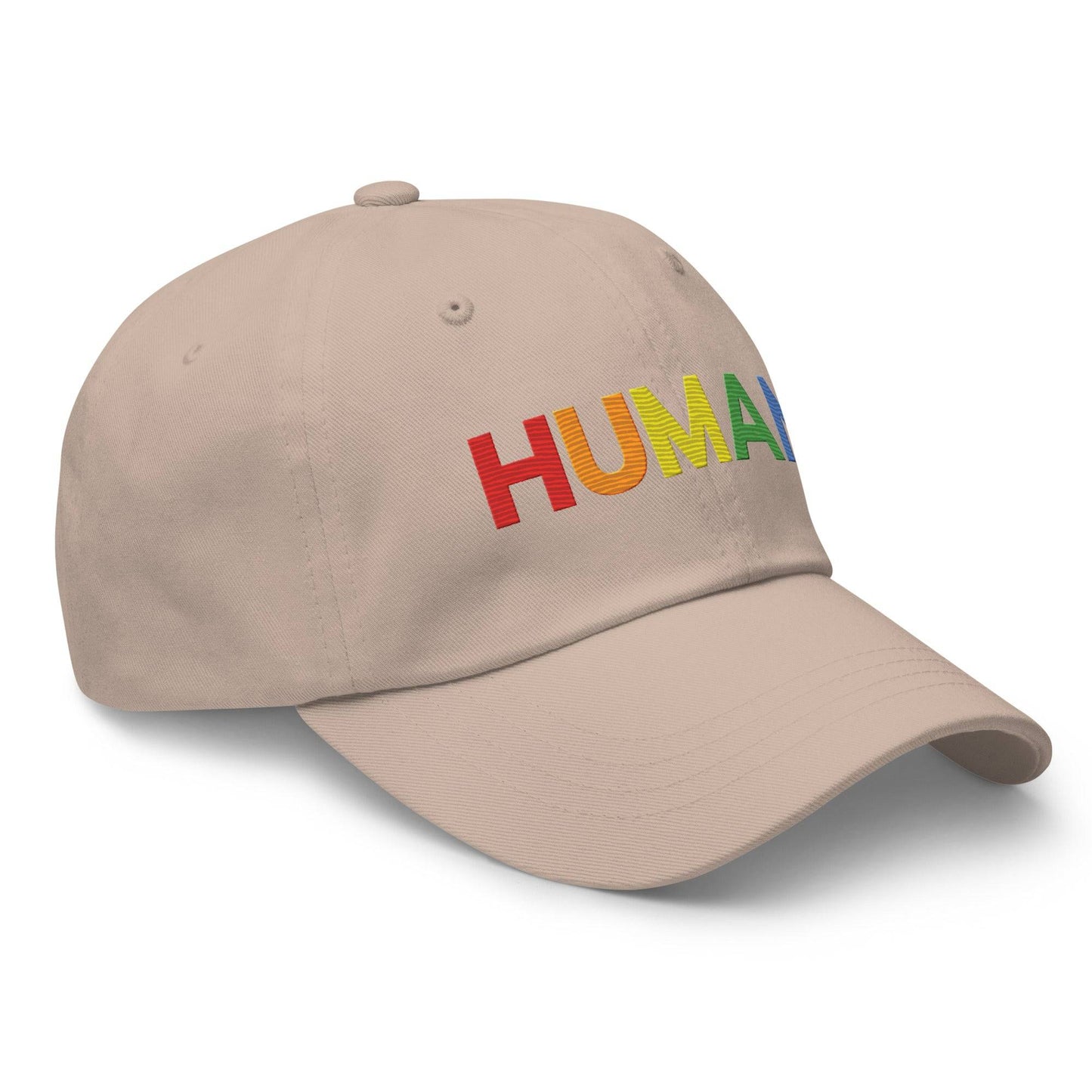 The Pridelity Human Cap is a black baseball hat, ideal for complementing pride ensembles, with the word "HUMAN" embroidered in vibrant rainbow colors on the front.