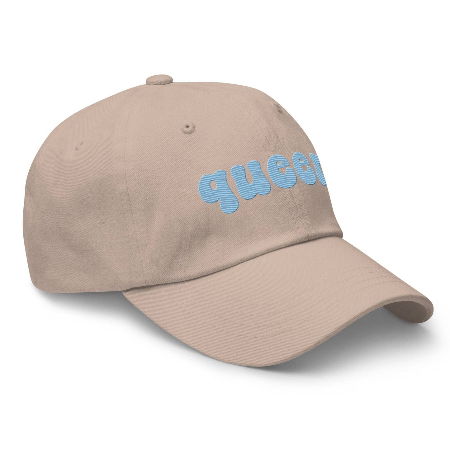 Introducing the Queer Cap by Pridelity, a black baseball cap with "queer" elegantly embroidered in light blue bold, rounded letters on the front. Perfect for pride outfits, it features a curved brim and top ventilation eyelets for added comfort.