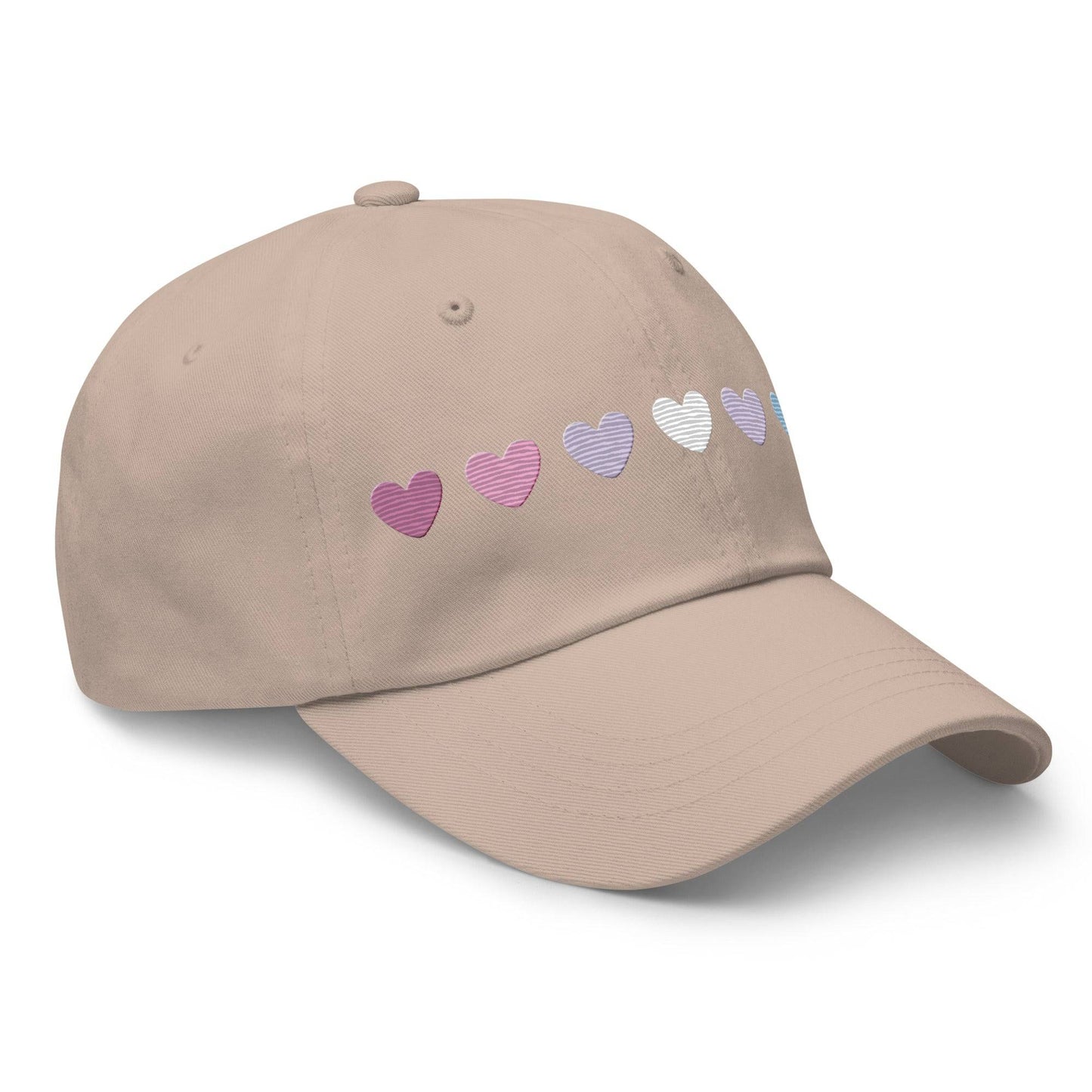 The Pridelity Bigender Hearts Cap, part of our Pride Collection, showcases a row of seven gradient heart symbols transitioning in color from pink to white to blue on a black base.