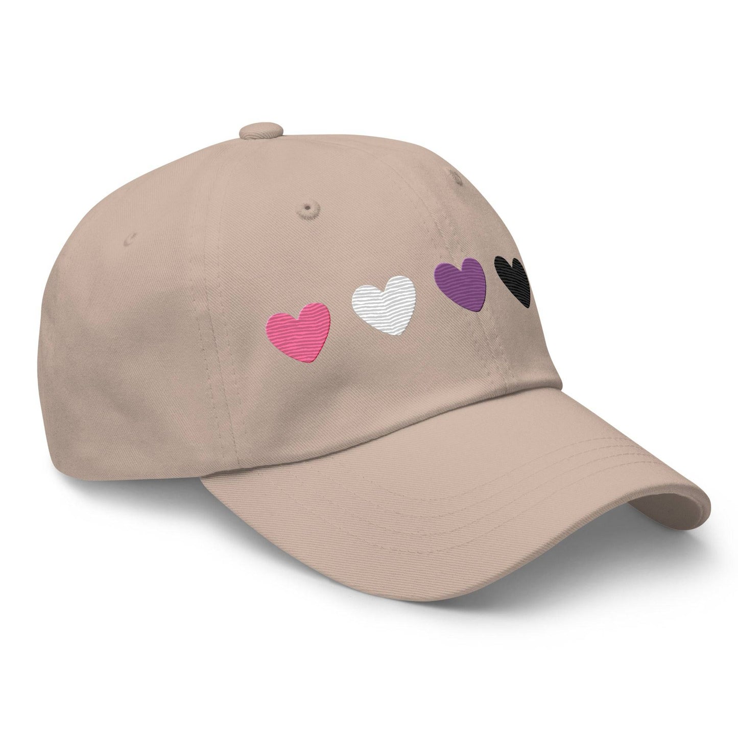 Introducing the Genderfluid Hearts Cap by Pridelity—a light blue baseball cap featuring five embroidered hearts in a vibrant spectrum of pink, gray, white, purple, black, and blue that captures the essence of pride outfits.