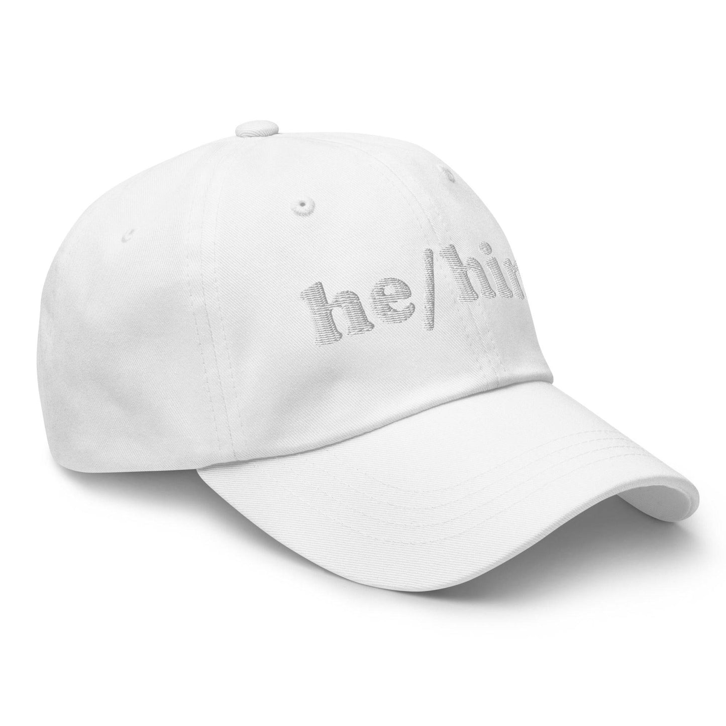Introducing the He/Him Cap by Pridelity: A stylish black cap featuring "he/him" embroidered in white on the front. It adds a subtle yet meaningful touch to pride outfits while celebrating identity with simplicity and elegance.