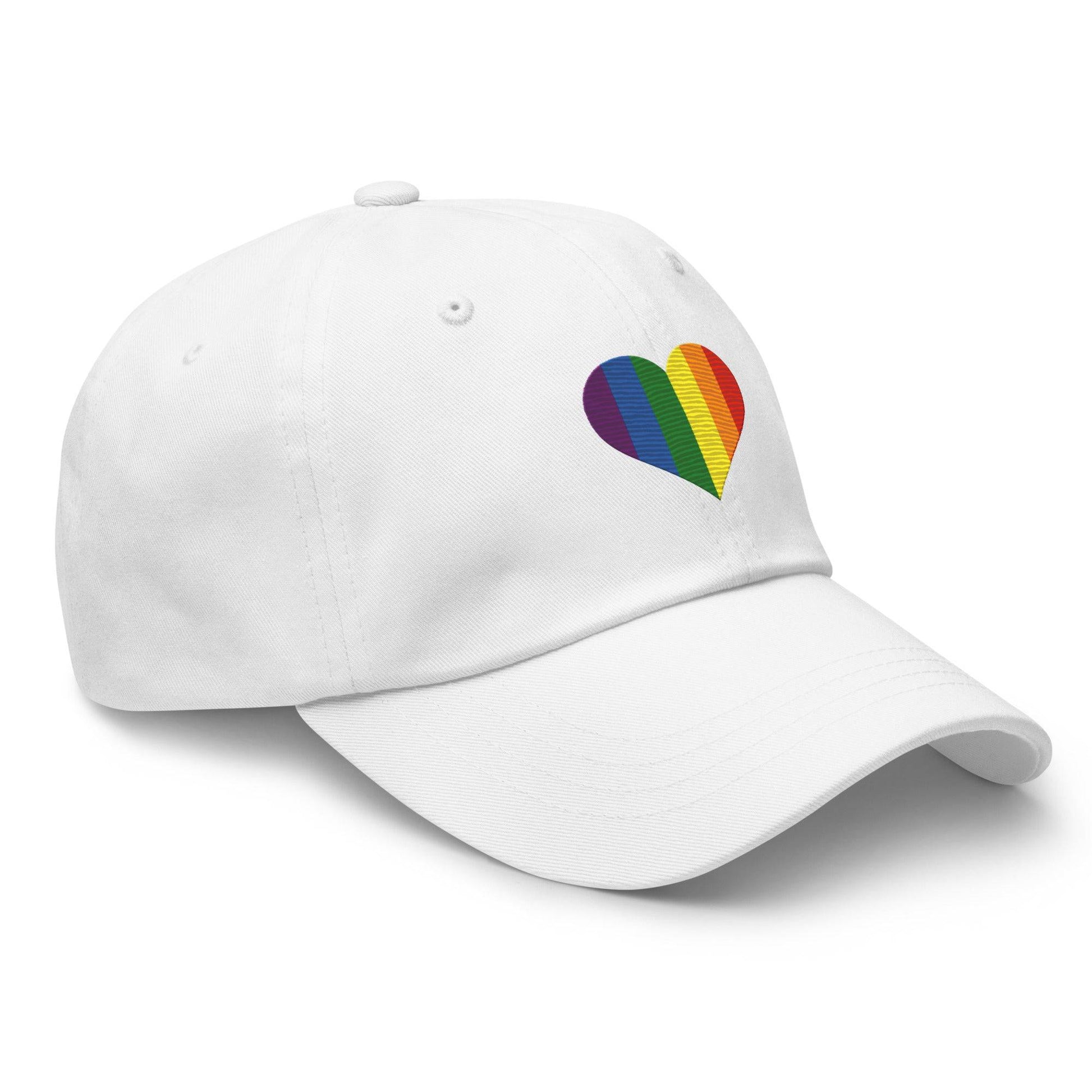 The Pride Heart Cap by Pridelity is a stylish black baseball cap adorned with a vibrant rainbow-colored heart design on the front, ideal for enhancing any pride outfit.