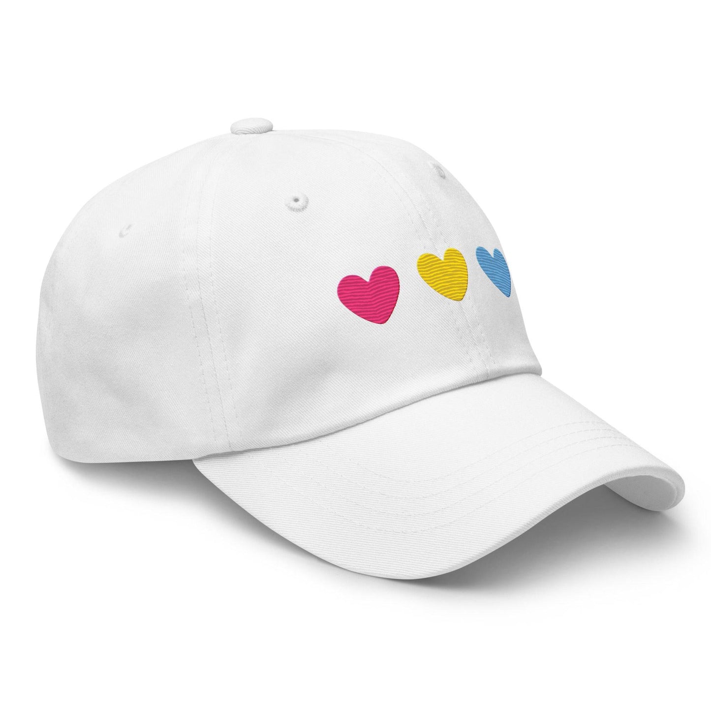 The Pan Hearts Cap by Pridelity, in a light blue hue, brings a playful touch to pride outfits with its three vibrantly embroidered hearts in pink, yellow, and blue.