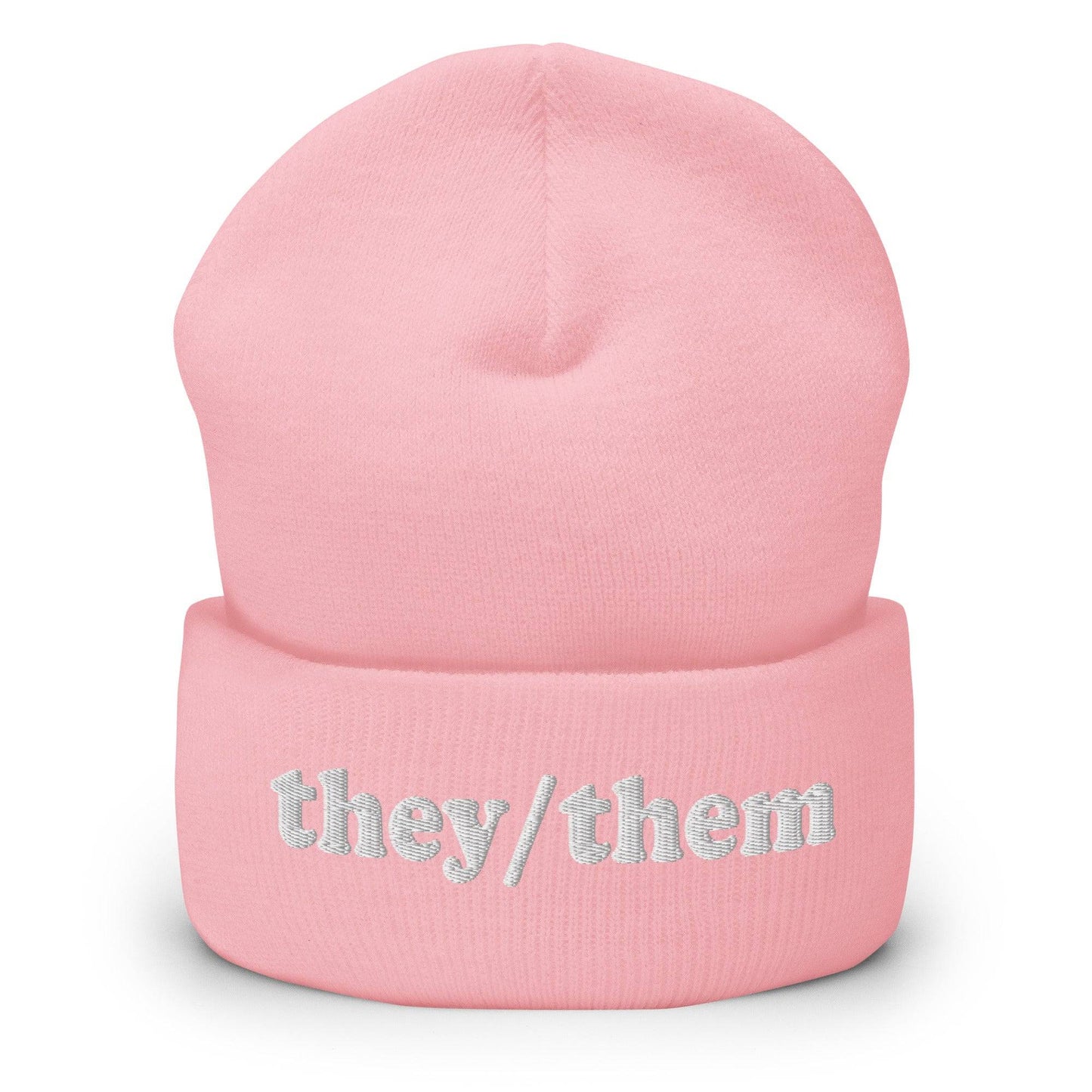 The Pridelity They/Them Beanie in heather grey features "they/them" embroidered in white letters on the cuff, making it a stylish essential for those seeking fashionable gay clothing.