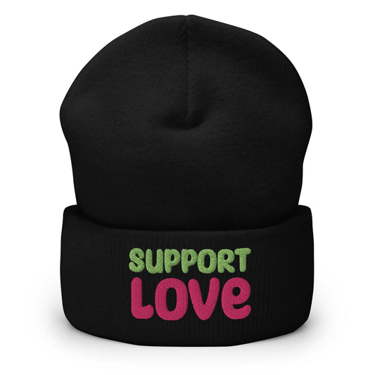 Introducing the Support Love Beanie by Pridelity, a standout piece from our gay clothing line. This white beanie features "SUPPORT LOVE" embroidered in eye-catching colors— "SUPPORT" in vibrant green and "LOVE" in bold pink—beautifully expressing positivity and solidarity.