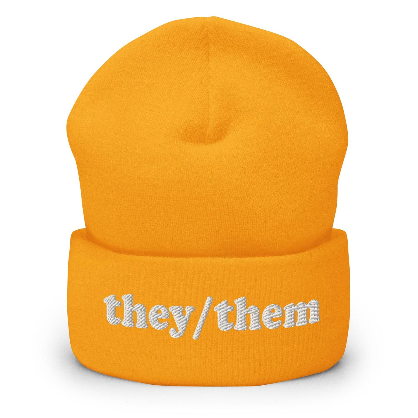 The Pridelity They/Them Beanie in heather grey features "they/them" embroidered in white letters on the cuff, making it a stylish essential for those seeking fashionable gay clothing.