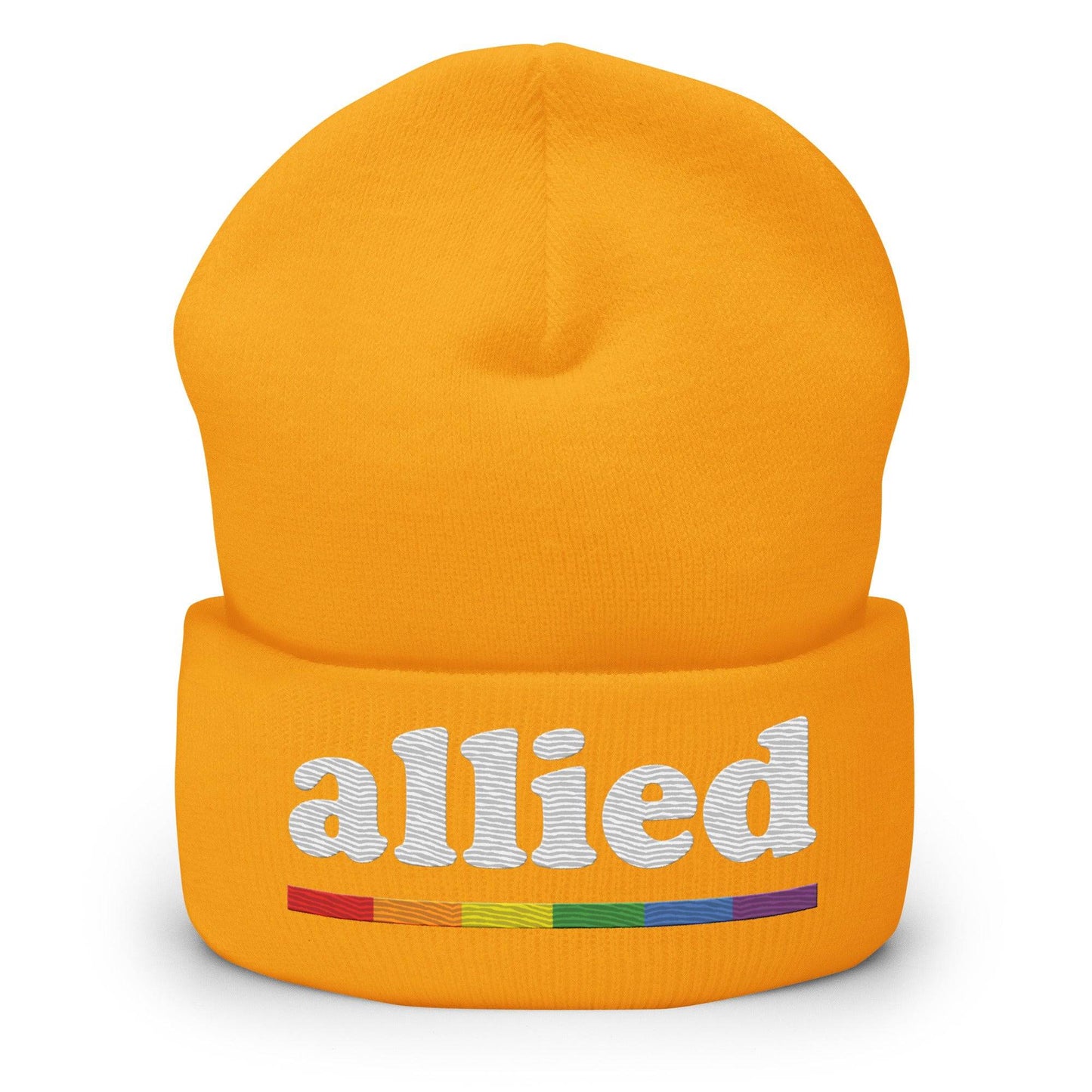 Introducing the Allied Beanie from Pridelity: This striking black beanie features the word "allied" embroidered in white, with a small rainbow-colored line below to celebrate Pride. It's crafted from textured fabric and has a folded bottom, making it an essential standout in any Pride Merch collection.