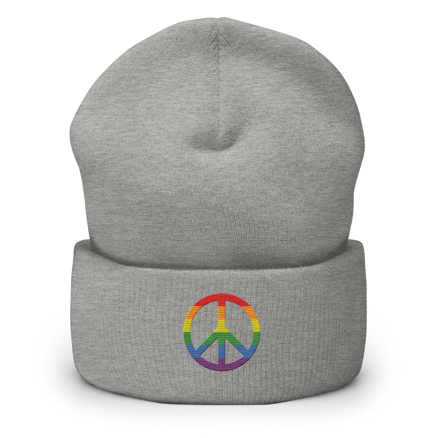 The Pridelity Peace Beanie, in black, showcases a vibrant rainbow-colored peace symbol on the front, making it the perfect accessory to add a touch of pride to any outfit. It is elegantly displayed against a plain white background.