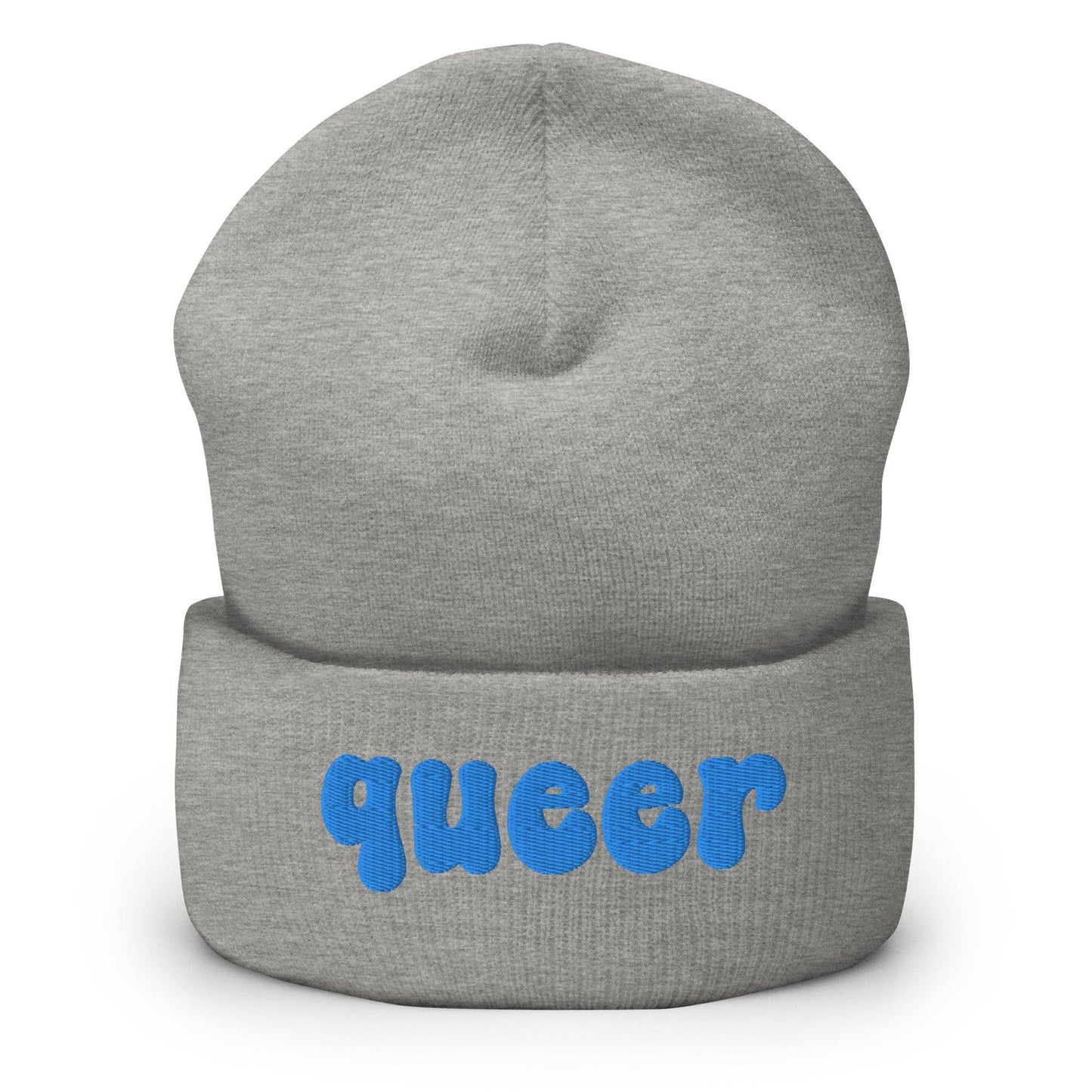 The Queer Beanie by Pridelity, in a delightful baby pink with the word "queer" emblazoned in playful blue bold letters on the front, is a standout piece of gay clothing.