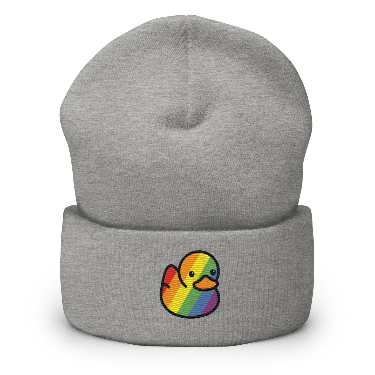 The Pride Duck Beanie by Pridelity, a striking piece of gay clothing, showcases an embroidered rubber duck with a rainbow pattern on its body, located on the cuff. This gold beanie features a folded brim and a rounded top.