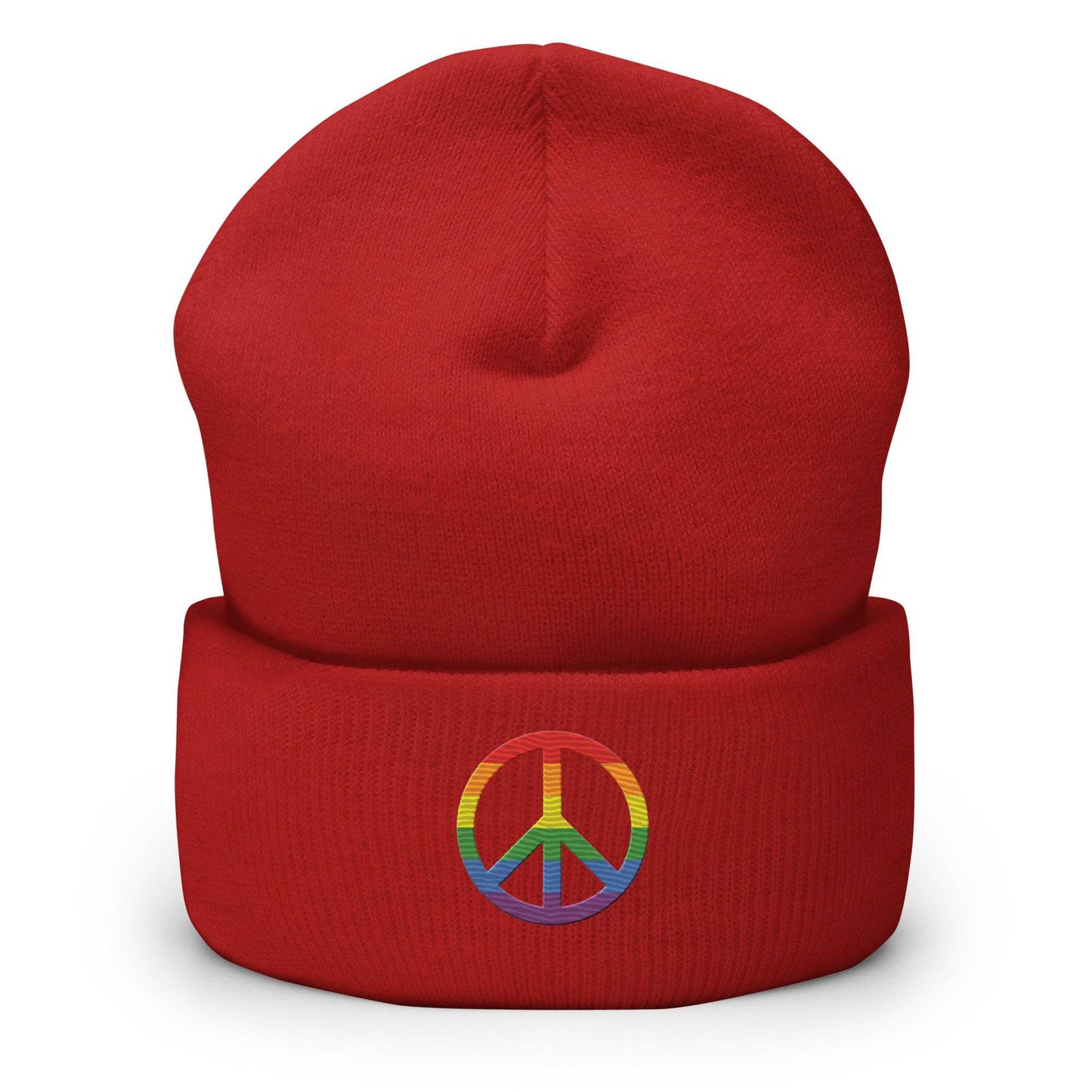 The Pridelity Peace Beanie, in black, showcases a vibrant rainbow-colored peace symbol on the front, making it the perfect accessory to add a touch of pride to any outfit. It is elegantly displayed against a plain white background.