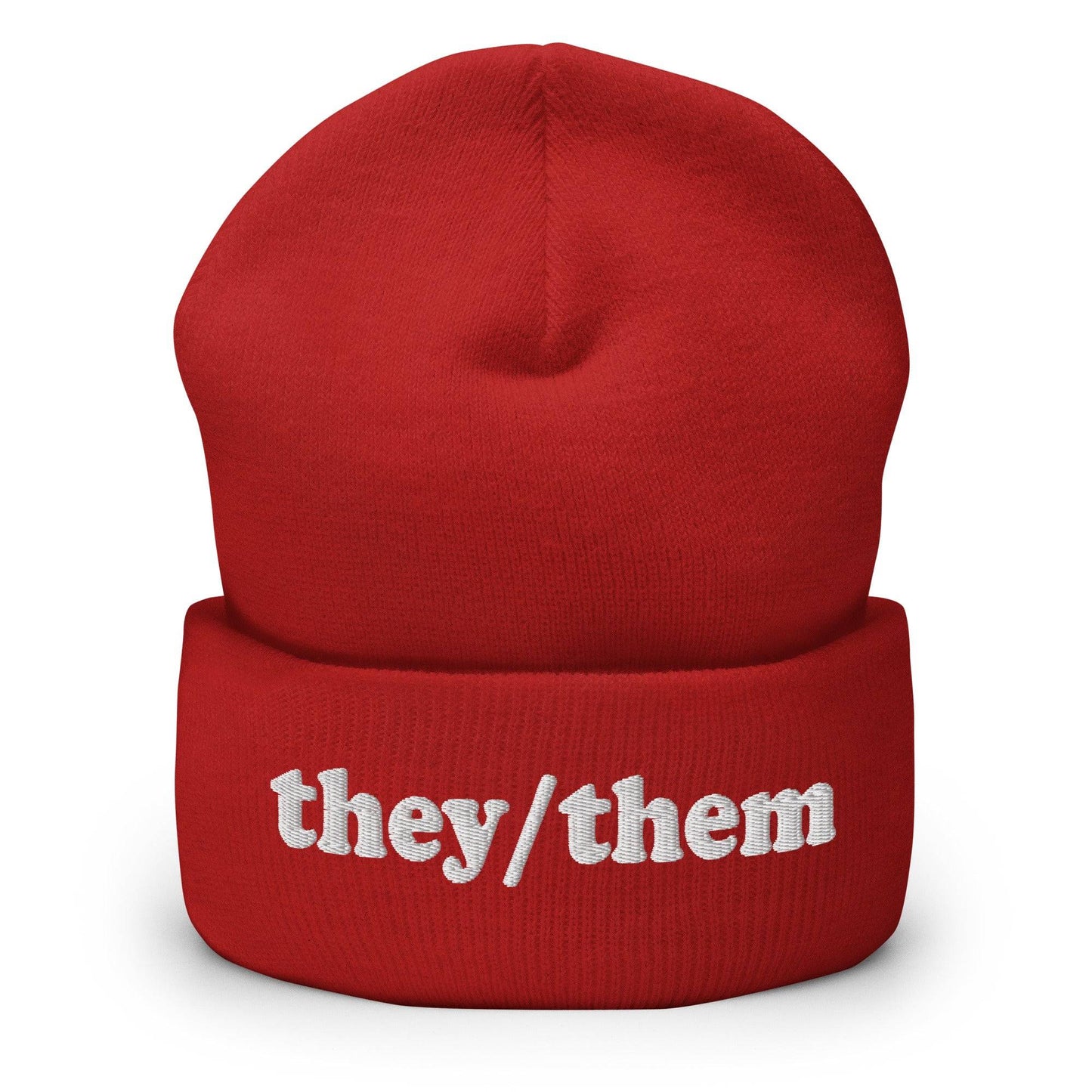 The Pridelity They/Them Beanie in heather grey features "they/them" embroidered in white letters on the cuff, making it a stylish essential for those seeking fashionable gay clothing.
