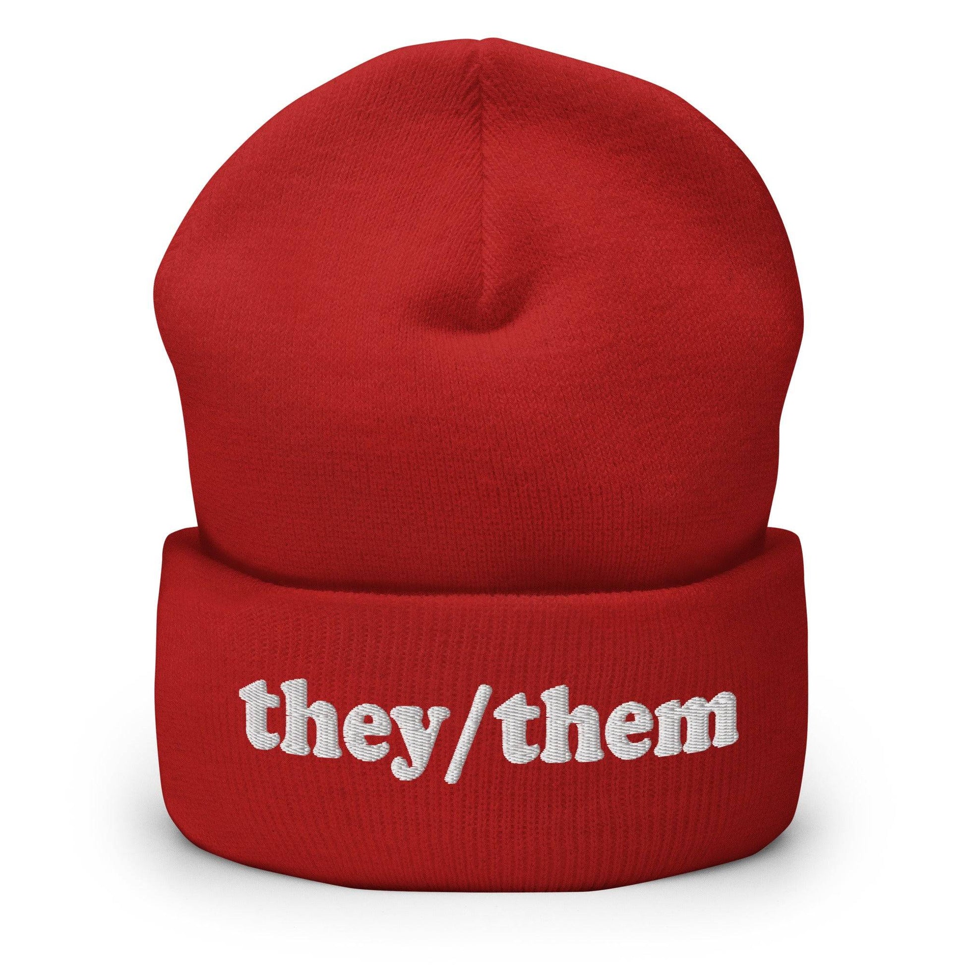 The Pridelity They/Them Beanie in heather grey features "they/them" embroidered in white letters on the cuff, making it a stylish essential for those seeking fashionable gay clothing.