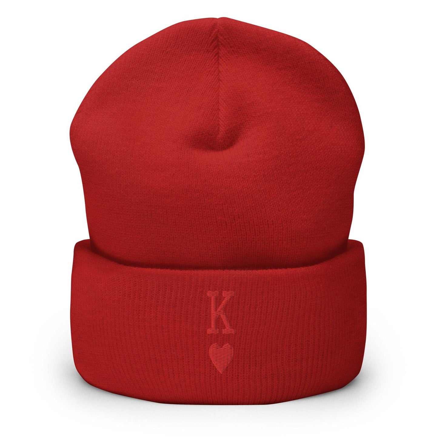 The King Beanie by Pridelity is a white beanie adorned with a red "K" and heart symbol on its folded edge, perfect for individuals expressing their identity through stylish gay clothing.