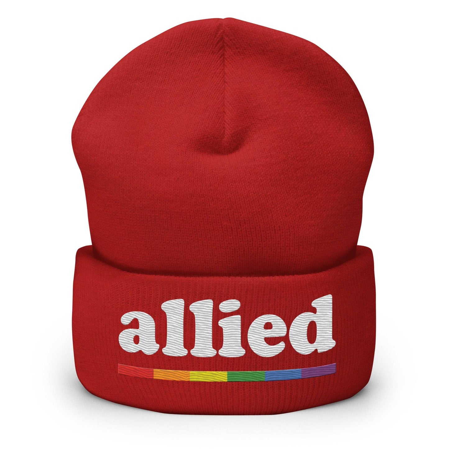 Introducing the Allied Beanie from Pridelity: This striking black beanie features the word "allied" embroidered in white, with a small rainbow-colored line below to celebrate Pride. It's crafted from textured fabric and has a folded bottom, making it an essential standout in any Pride Merch collection.