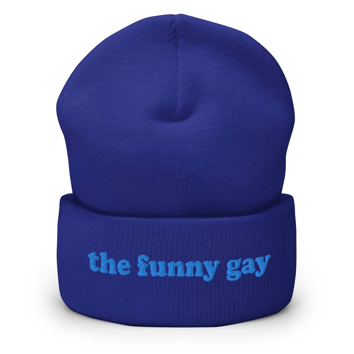 The Pridelity "The Funny Gay Beanie" in royal blue features the embroidered text "the funny gay" in light blue on the front cuff, providing a playful nod to gay fashion.