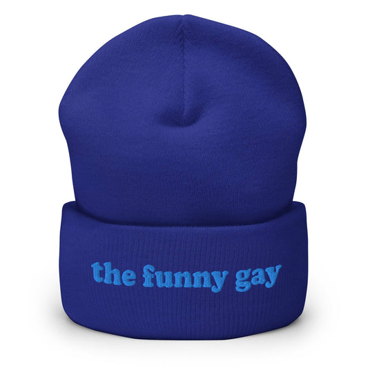 The Pridelity "The Funny Gay Beanie" in royal blue features the embroidered text "the funny gay" in light blue on the front cuff, providing a playful nod to gay fashion.