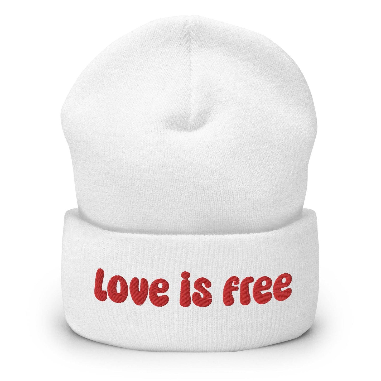 The Love Is Free Beanie by Pridelity is a baby pink accessory that boldly features the phrase "Love is free" in red on the front cuff, making it a perfect and stylish addition to any gay clothing collection for those embracing their authentic selves.
