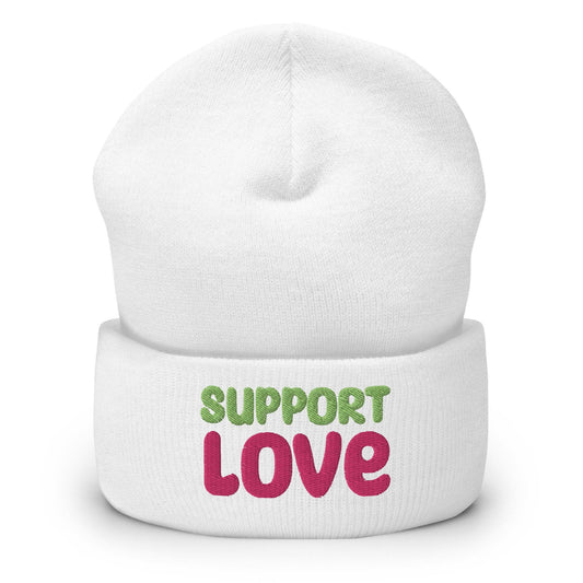 Introducing the Support Love Beanie by Pridelity, a standout piece from our gay clothing line. This white beanie features "SUPPORT LOVE" embroidered in eye-catching colors— "SUPPORT" in vibrant green and "LOVE" in bold pink—beautifully expressing positivity and solidarity.