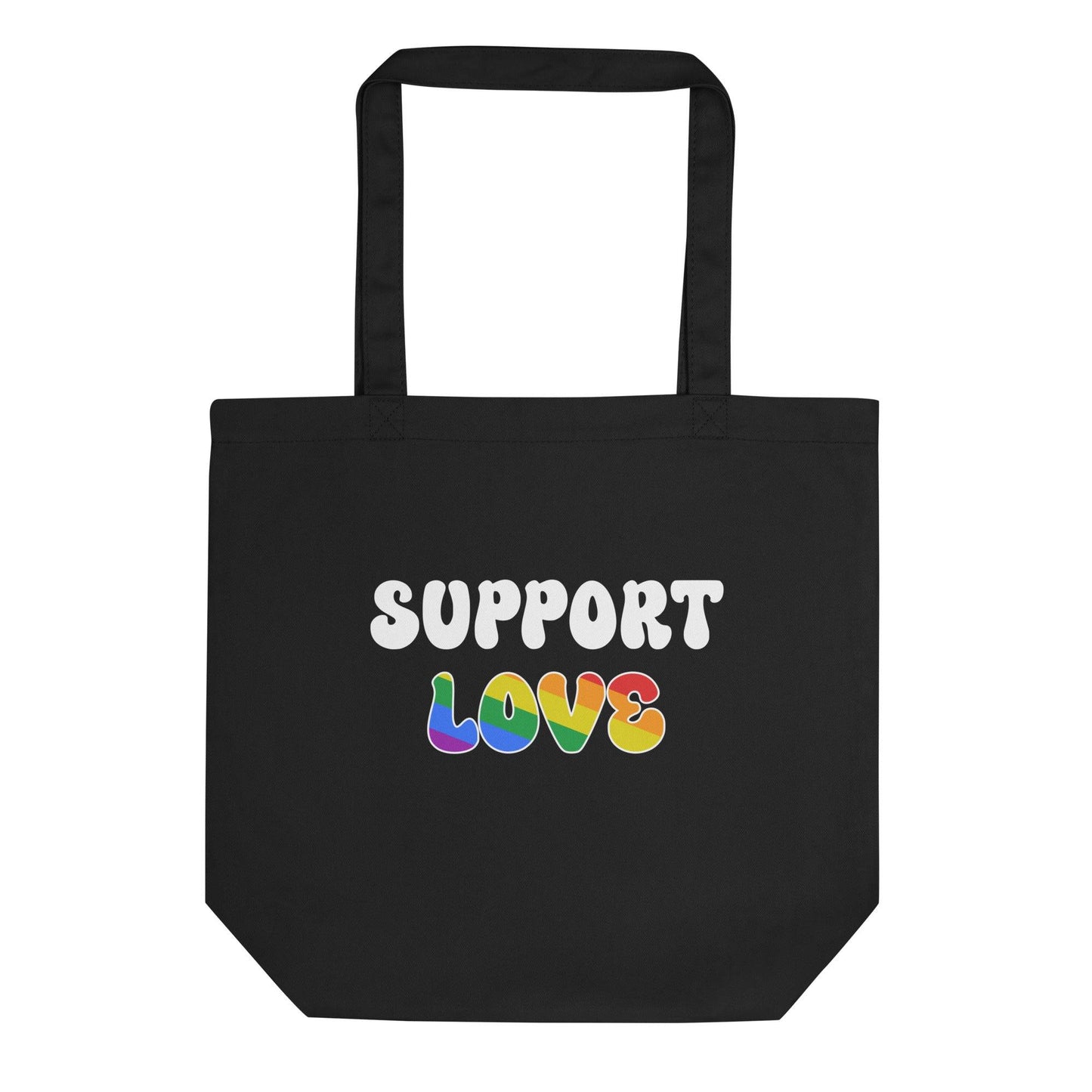 Introducing the Support Love Tote Bag by Pridelity: a stylish black tote bag adorned with the phrase "SUPPORT LOVE," where "LOVE" is presented in vibrant rainbow colors to symbolize inclusivity and pride. Ideal for visits to your favorite rainbow shop, this tote features long handles for easy shoulder carrying.